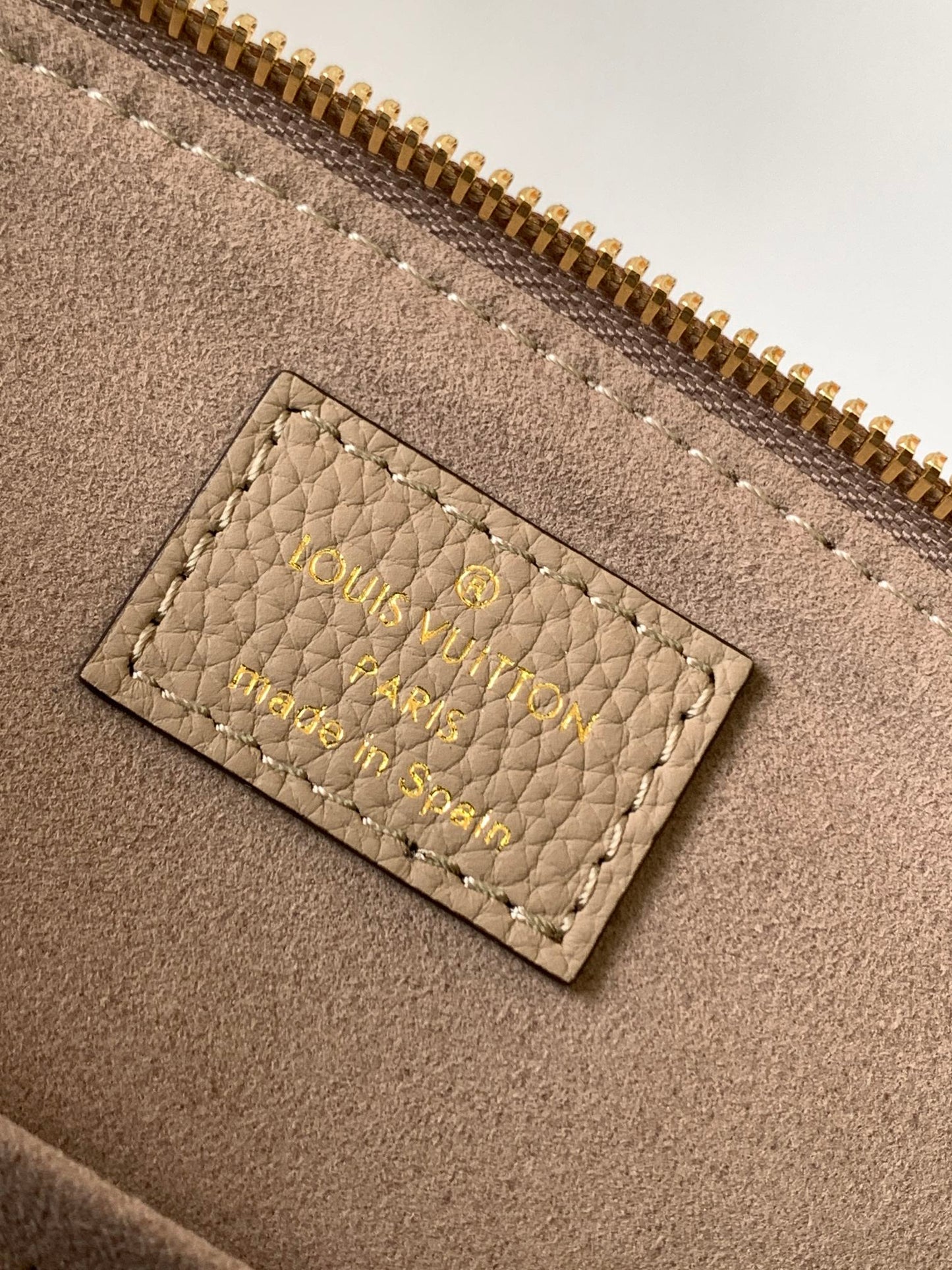 Louis Vuitton Rivoli PM Monogram Empreinte Leather Bag - Turtledove