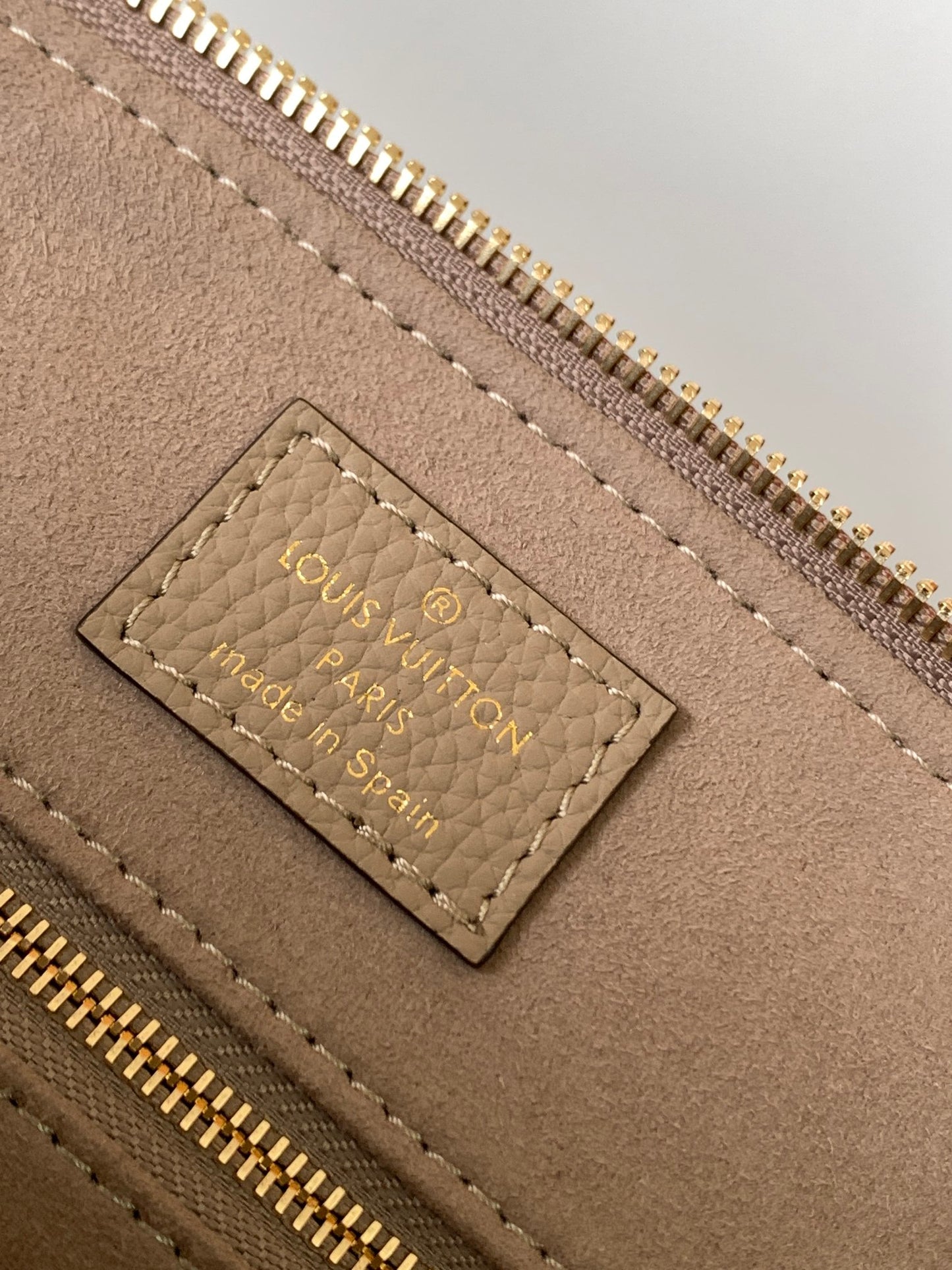 Louis Vuitton Montaigne BB Monogram Empreinte Leather Handbag - Tourterelle