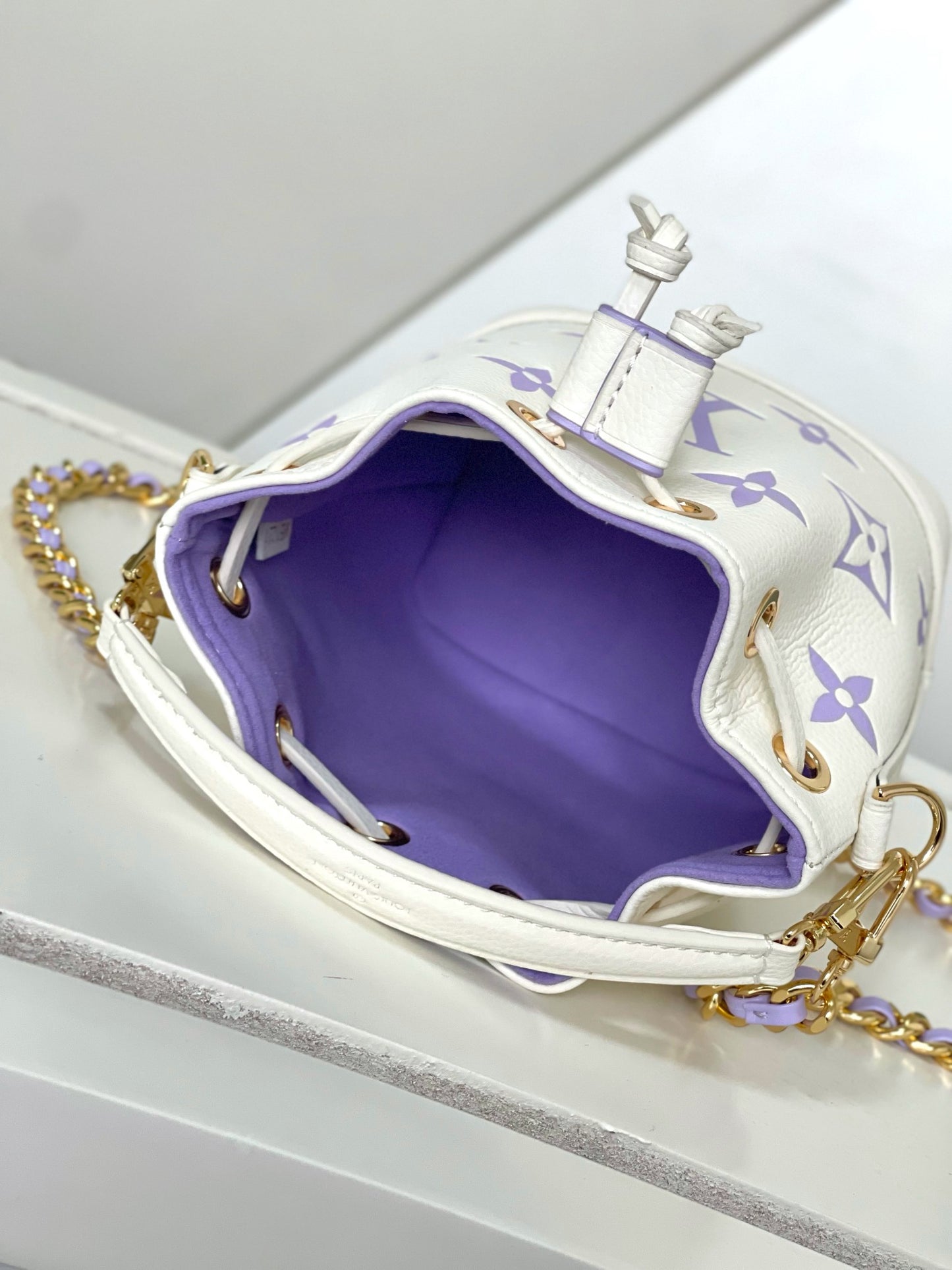 Mini Drawstring Bucket Crossbody Bag - White with Purple Monogram & Gold Chain