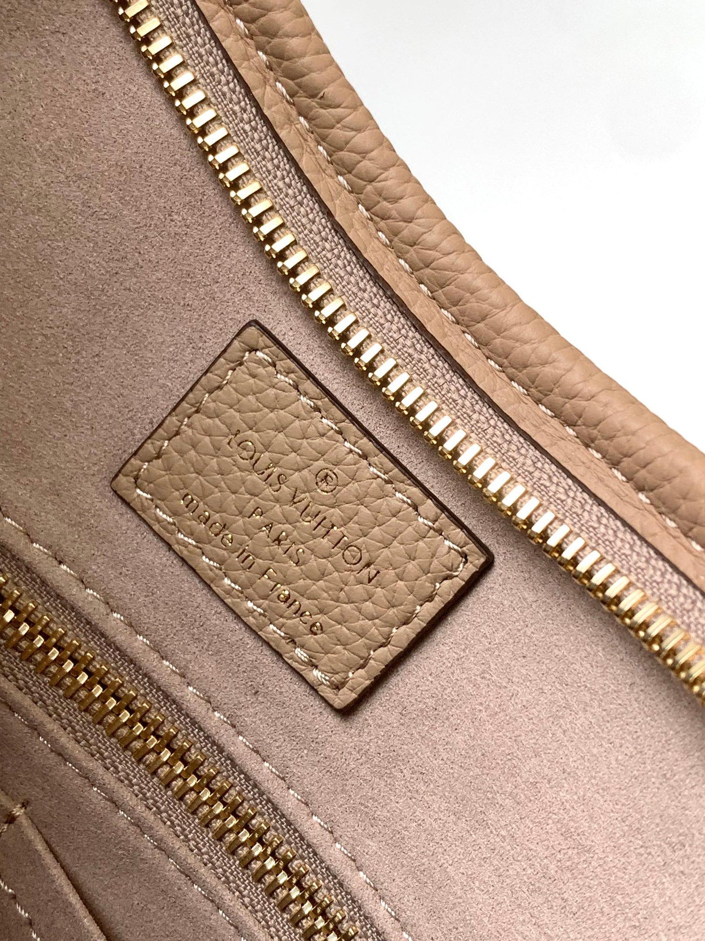 Louis Vuitton Bagatelle Monogram Empreinte Leather Handbag - Turtledove