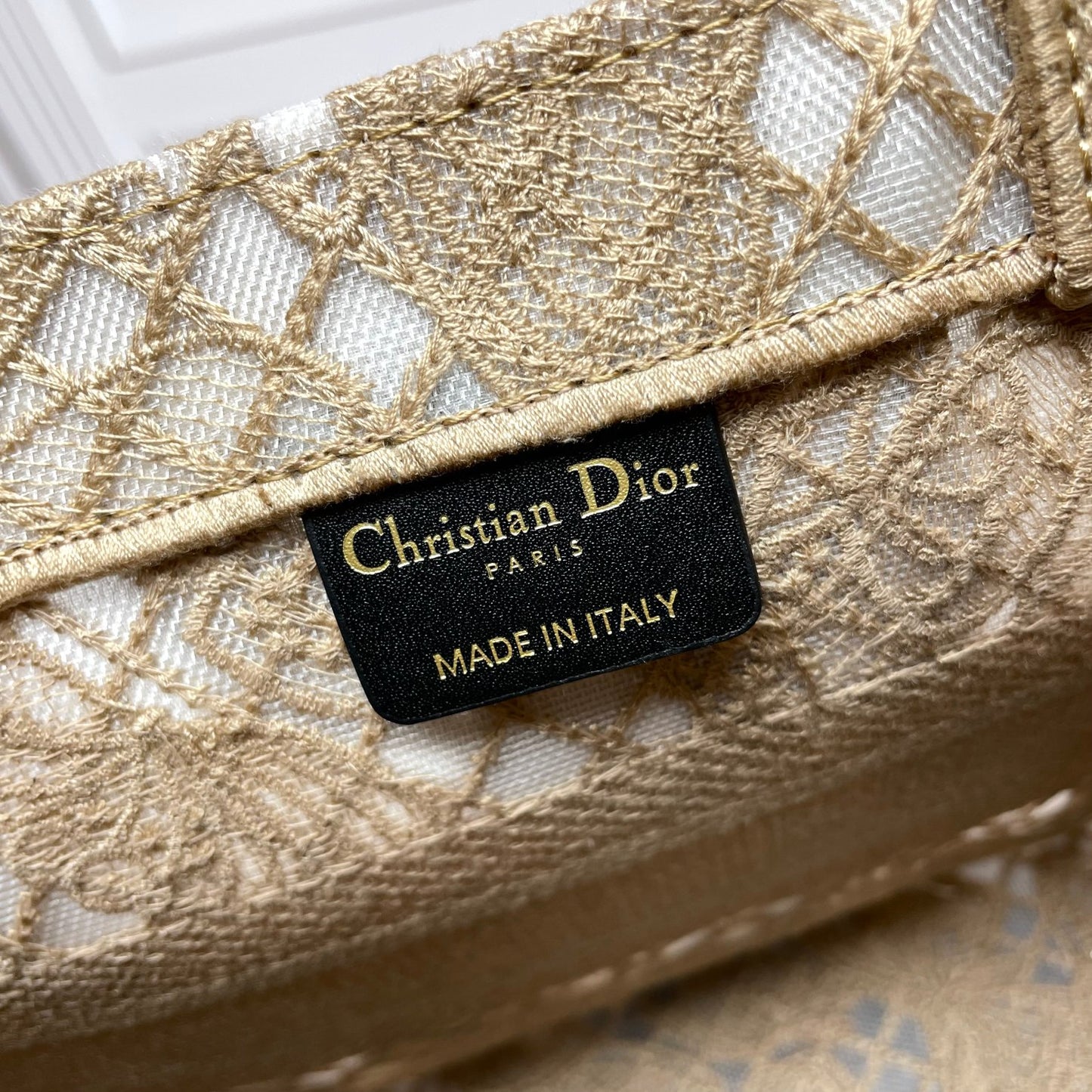 Dior Elegant Beige Canvas Tote Bag with Embroidered Butterfly Details