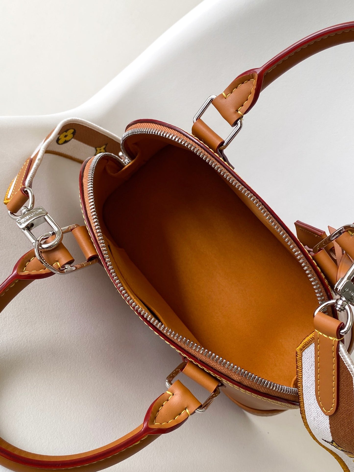 Louis Vuitton Alma BB Epi Leather Handbag with Jacquard Strap - Tan