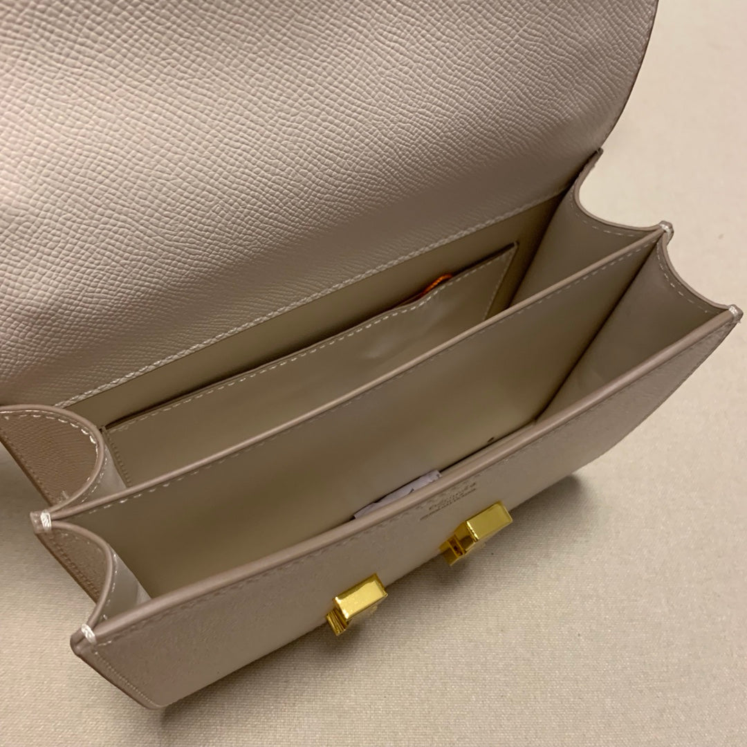 Elegant Cream Shoulder Bag with Gold H Clasp - Luxury Designer Style Crossbody