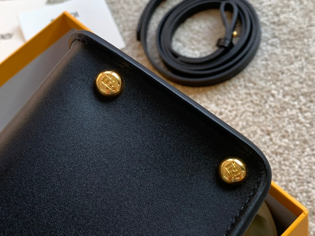 Fendi First Small Black Leather Clutch Bag with Gold-Finish Metal Handle