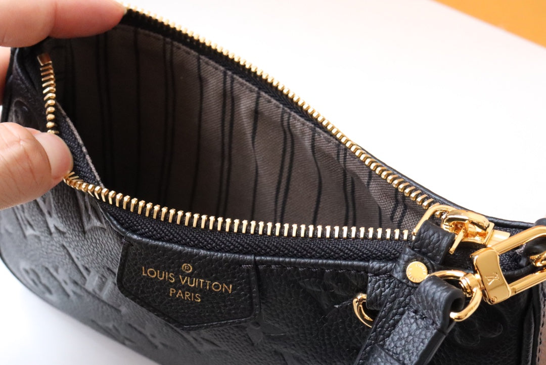 Louis Vuitton Monogram Empreinte Leather Pochette Accessoires - Black