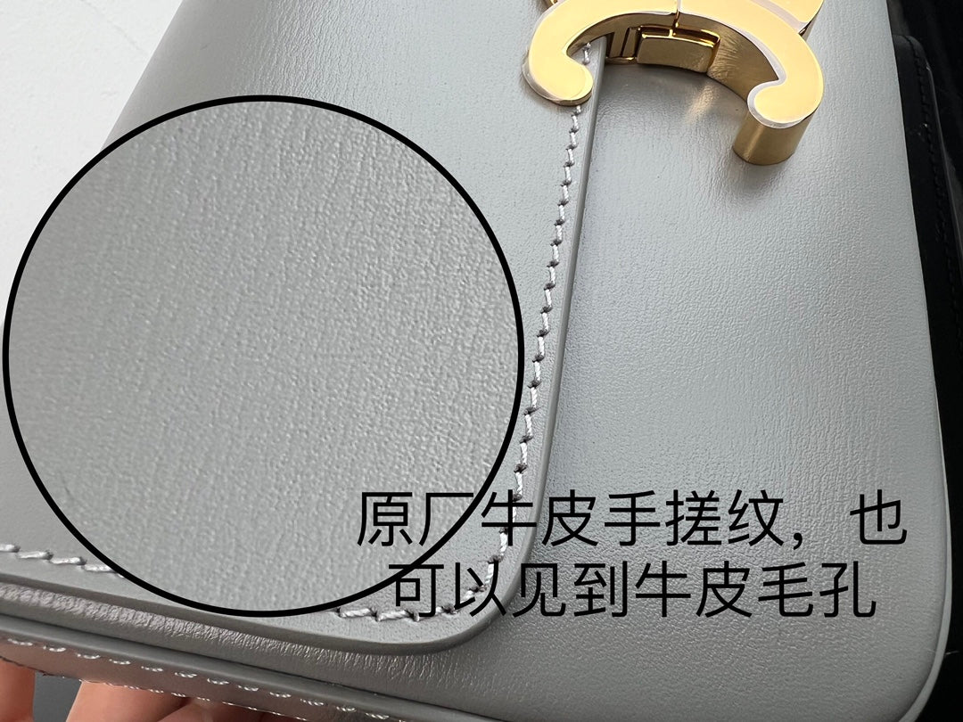 Light Blue Hand-Rubbed Cowhide Leather Bag with Gold Clasp Detail