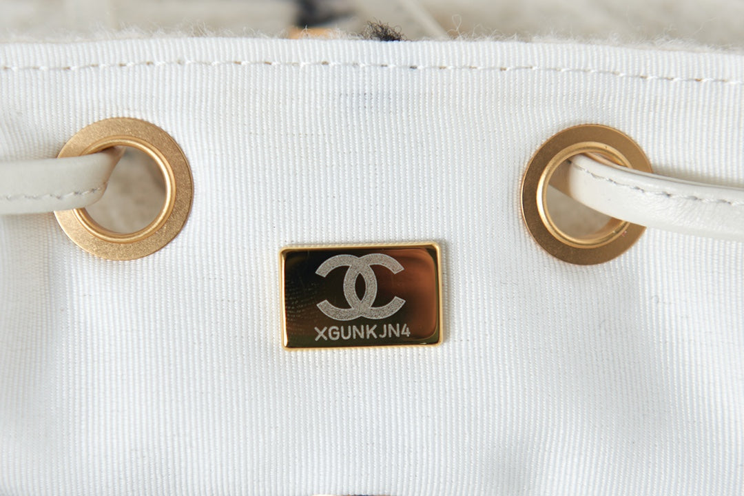 Elegant White and Black Quilted Tweed Mini Backpack with Gold Chain Straps