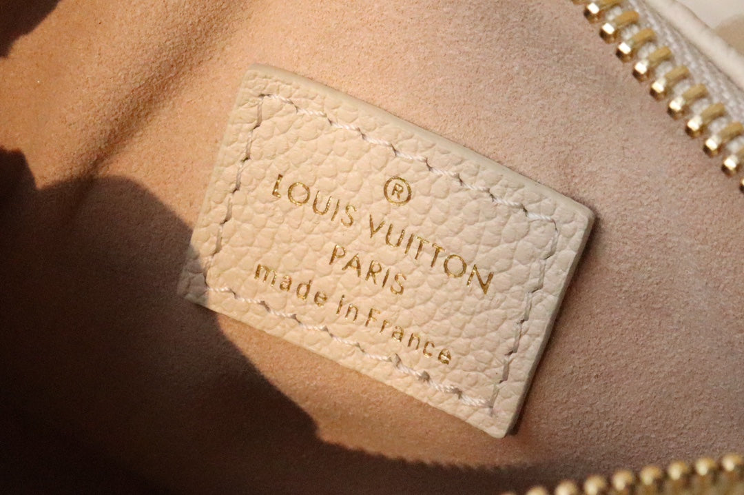 Louis Vuitton Nano Speedy Monogram Empreinte Leather Handbag - Cream/Pink