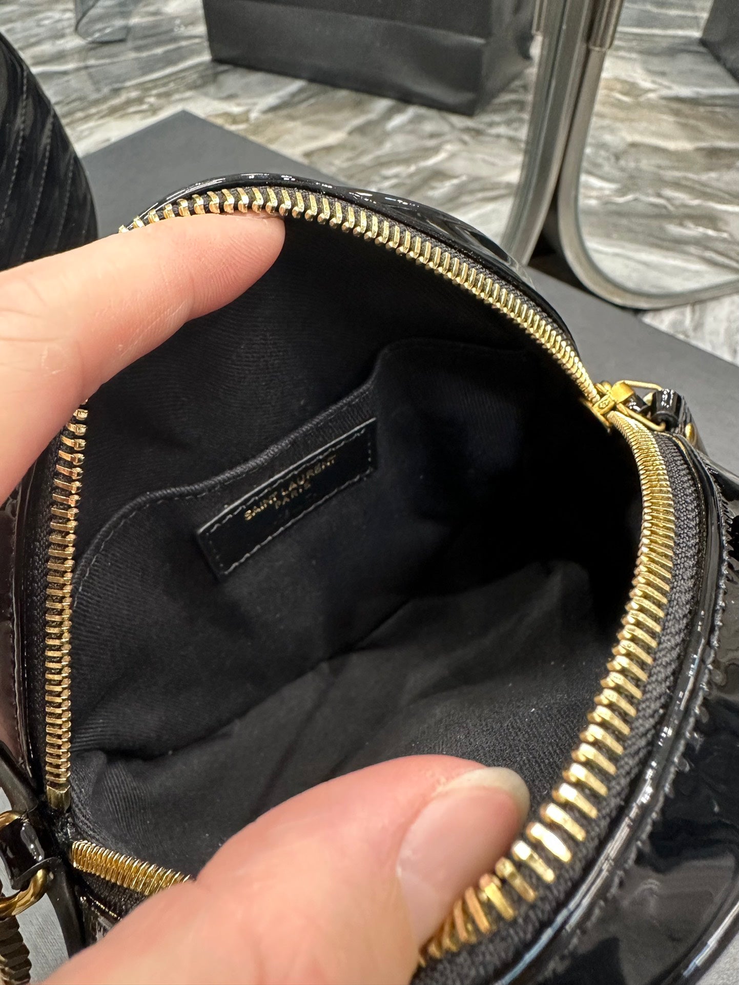 Saint Laurent Vinyle Round Camera Bag in Chevron-Quilted Leather - Black