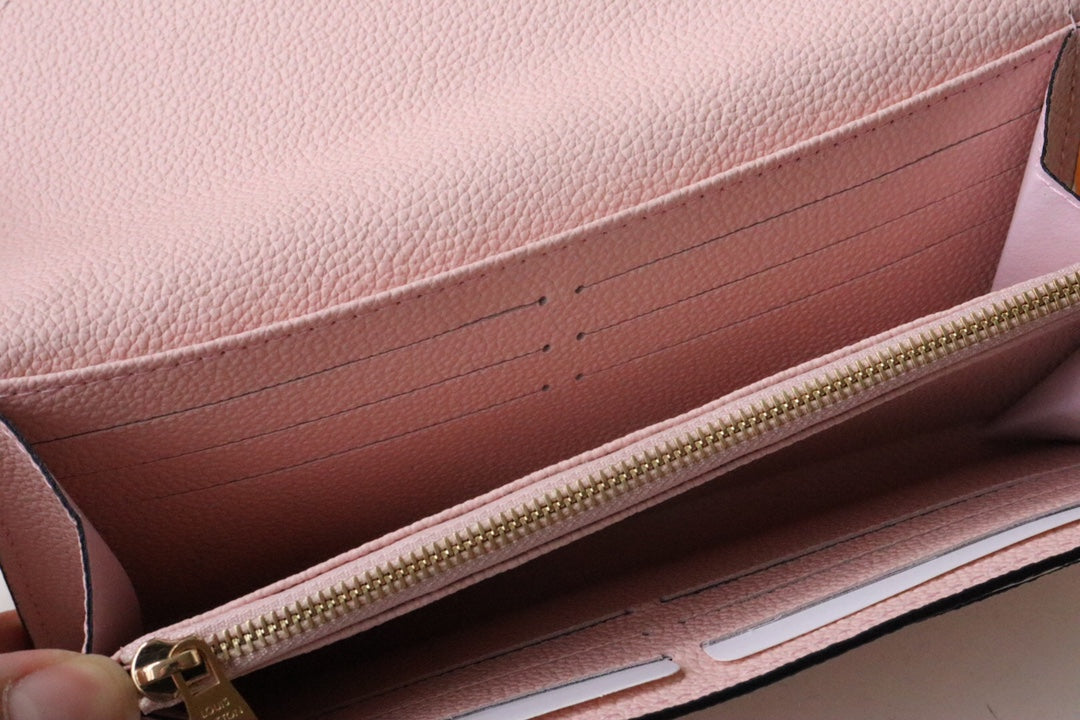 Louis Vuitton Sarah Wallet Monogram Empreinte Leather Light Pink