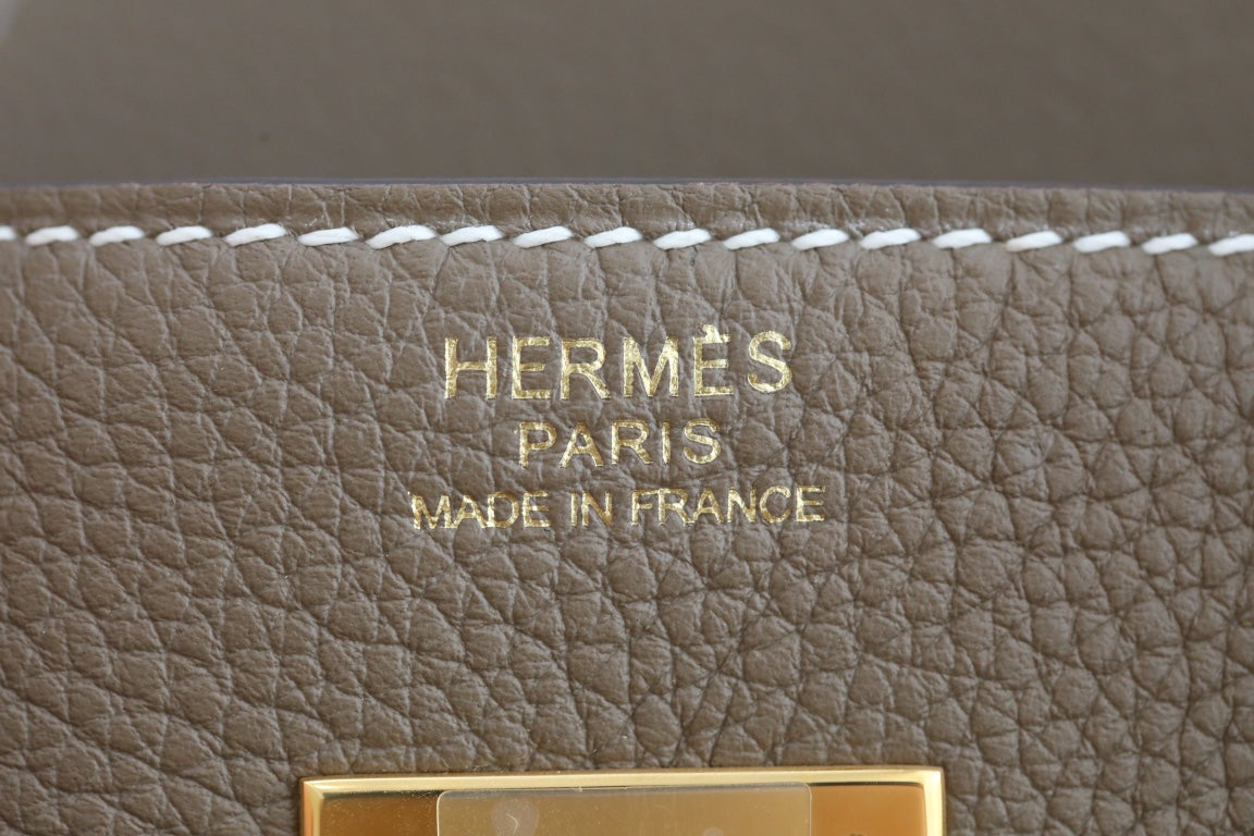 Elegant Taupe Leather Top-Handle Handbag with Gold-Tone Hardware