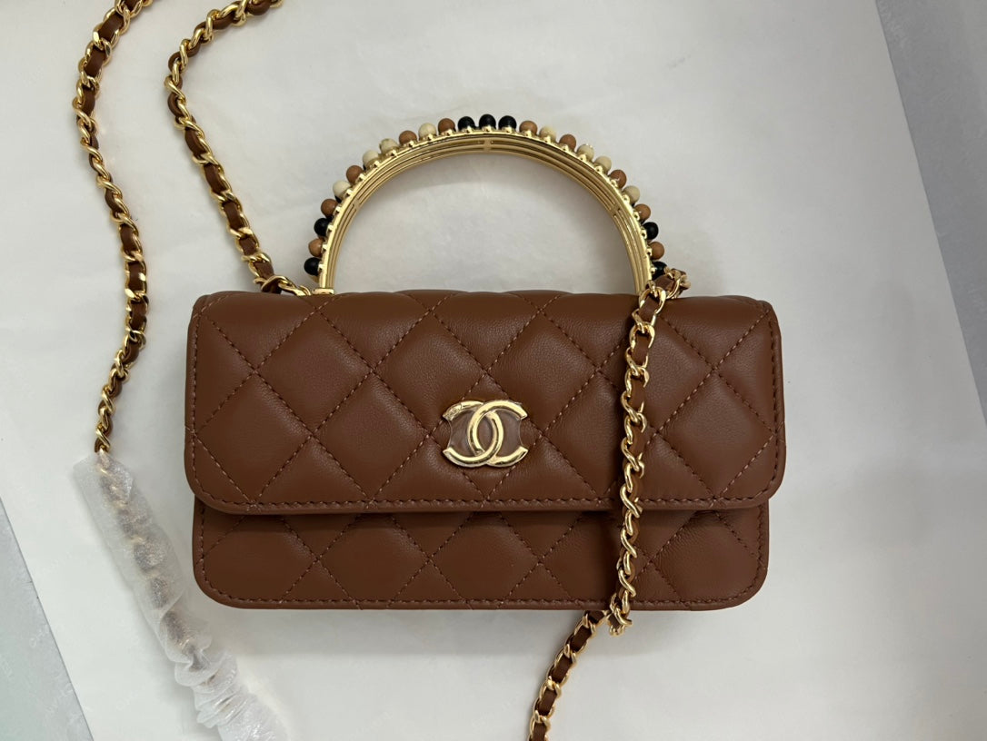 Brown Quilted Handbag with Jeweled Top Handle and Gold Chain Strap