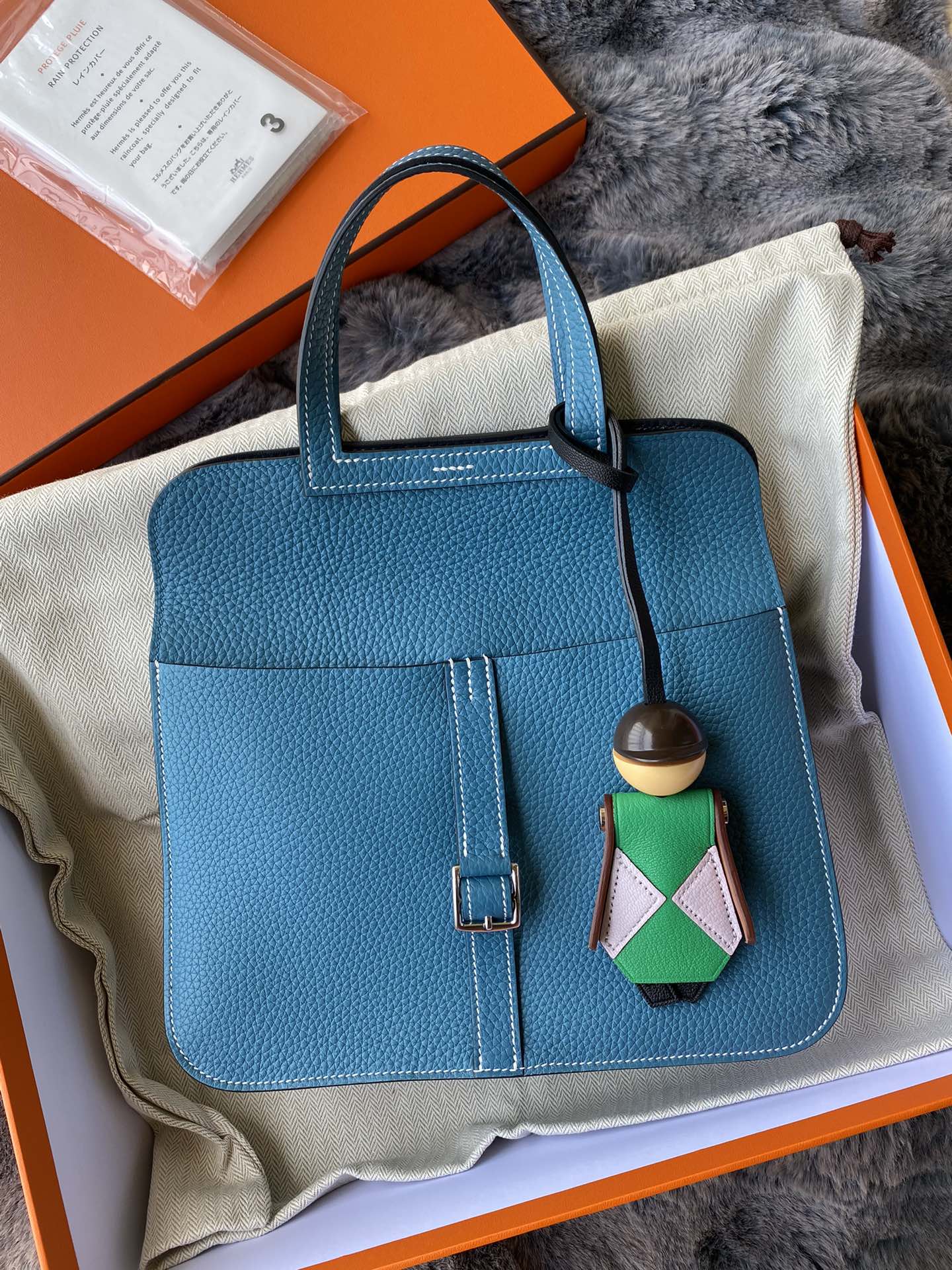 Hermès Blue Leather Halzan Style Handbag with Charm in Signature Box