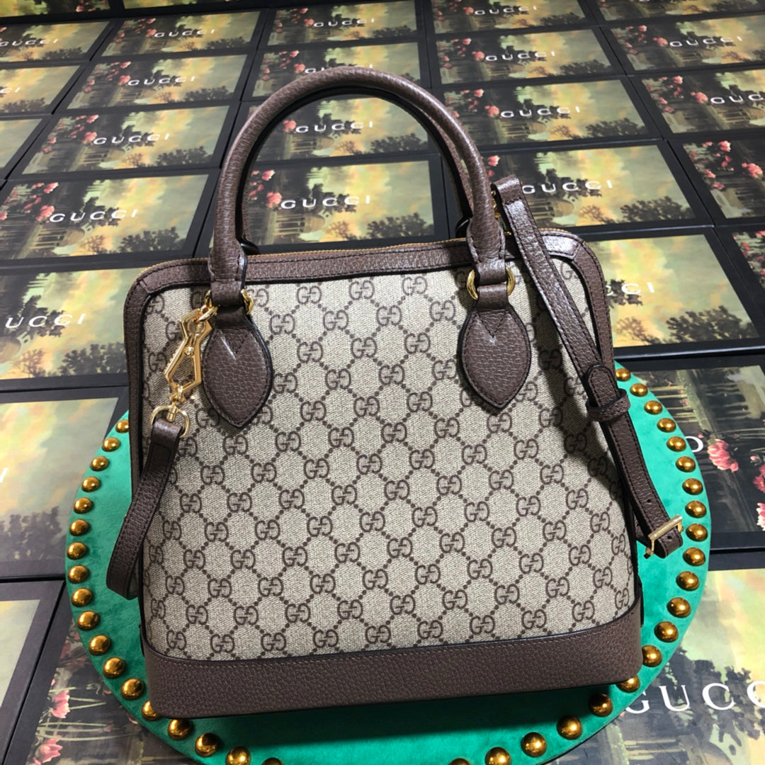 Gucci Classic Monogram Canvas Handbag with Horsebit Detail and Red Print