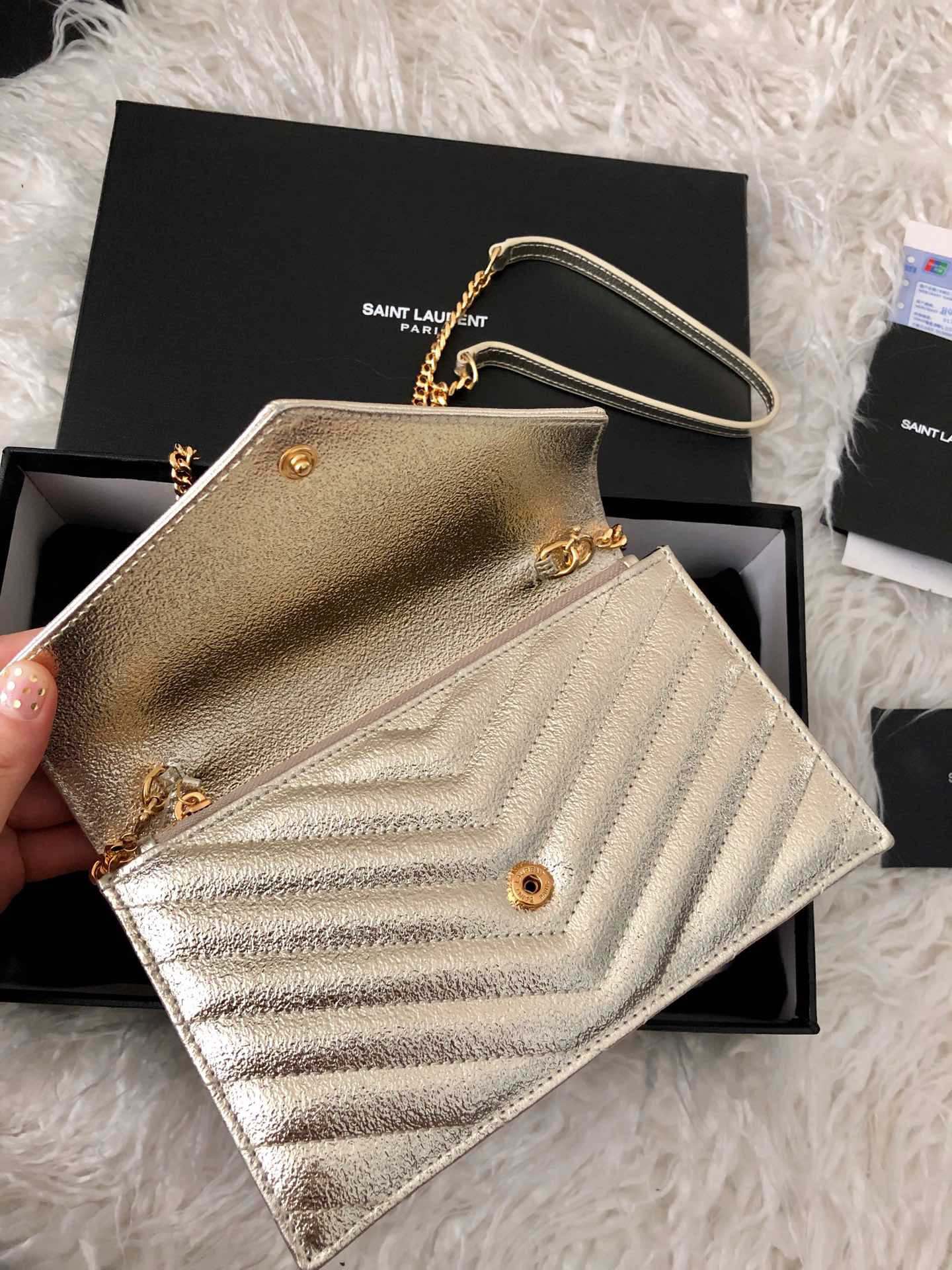 Saint Laurent Cassandre Matelassé Wallet on Chain in Gold Quilted Leather