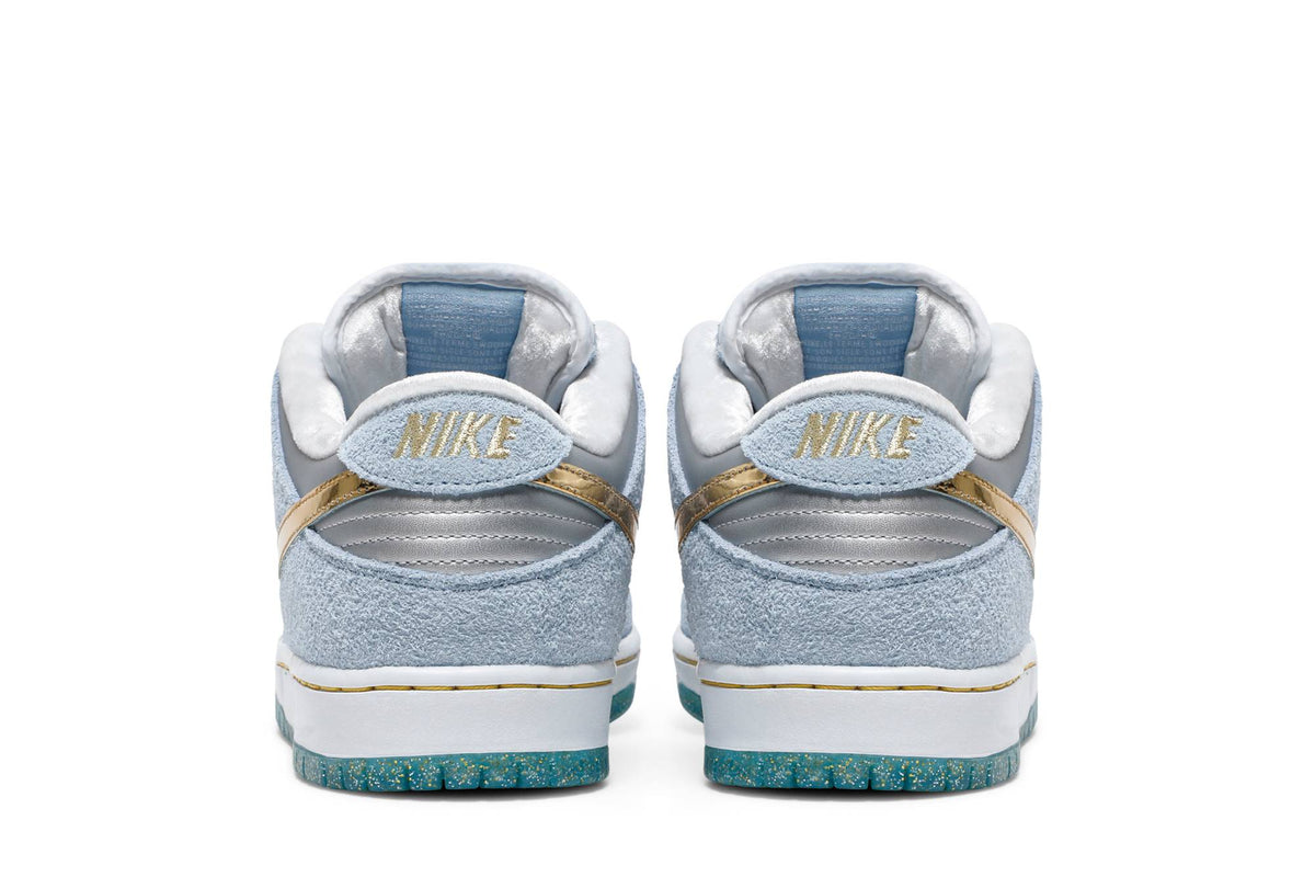 Sean Cliver X Nike SB Dunk Low Holiday Special DC9936-100
