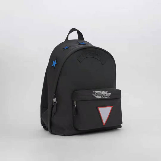 Black Urban Backpack with Star Accents and Geometric Logo