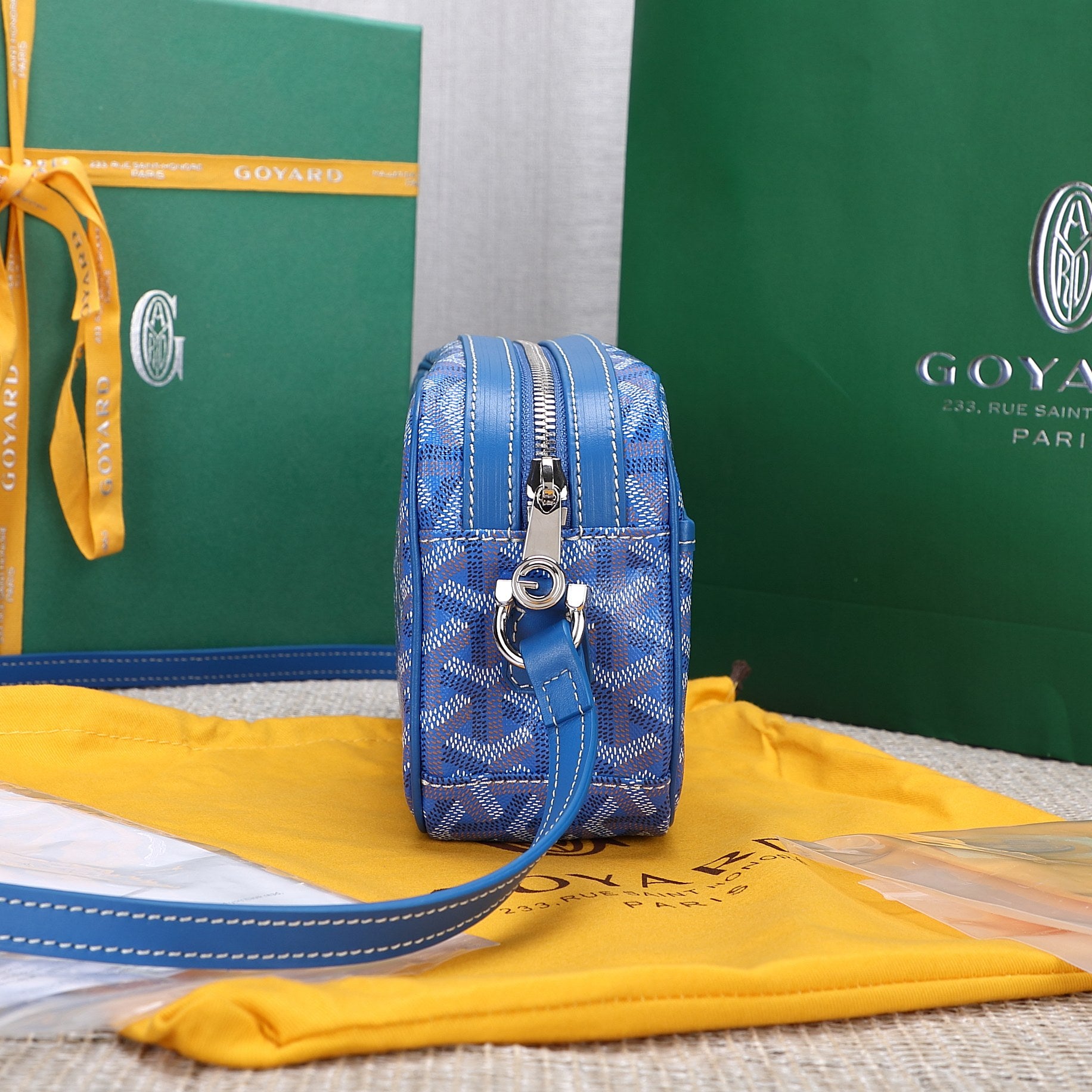 Gogy Blue Chevron Print Leather Crossbody Bag with Stripe Detail