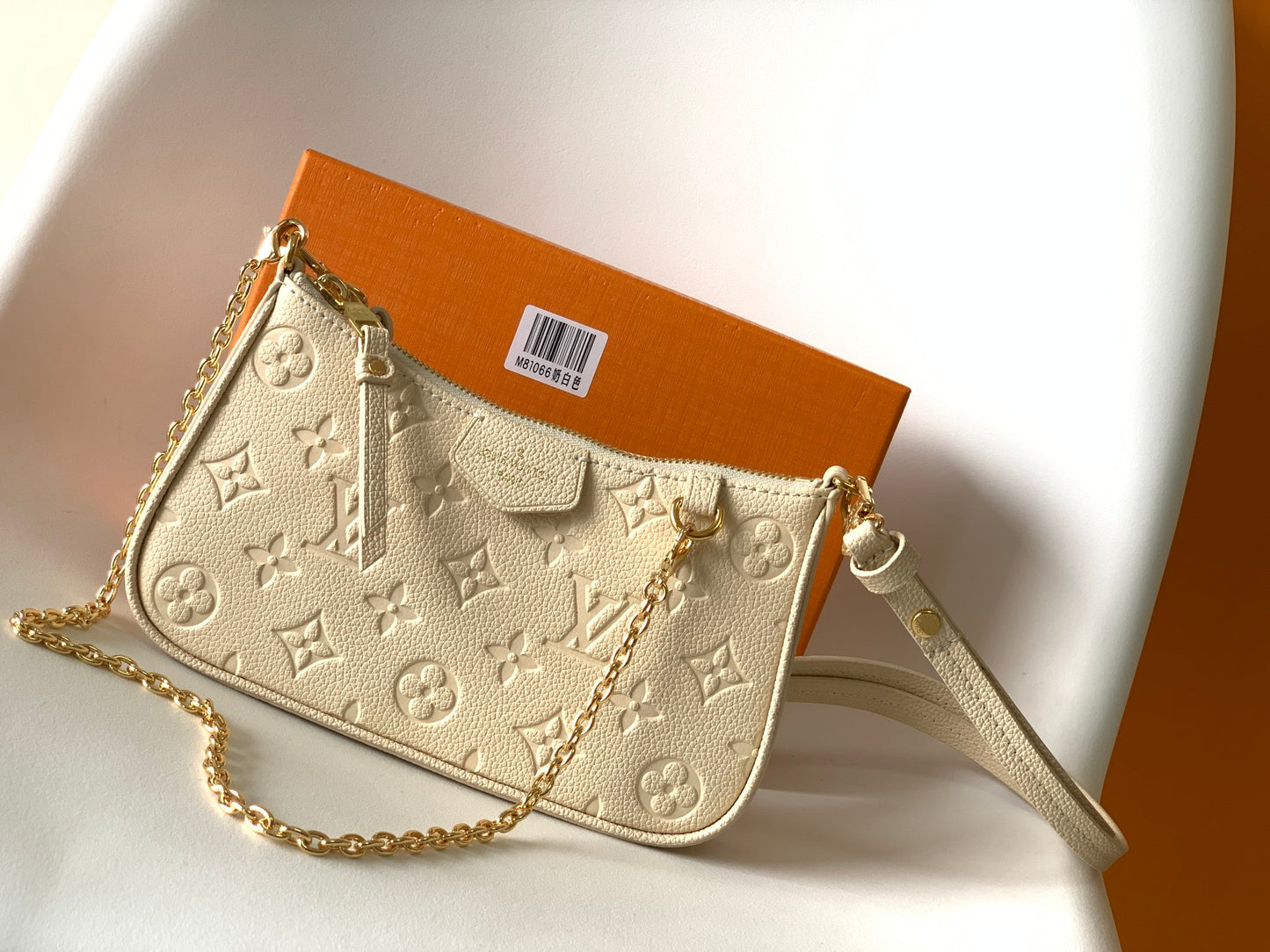 Women's Floral Embossed Cream Shoulder Bag with Gold-Tone Chain Strap