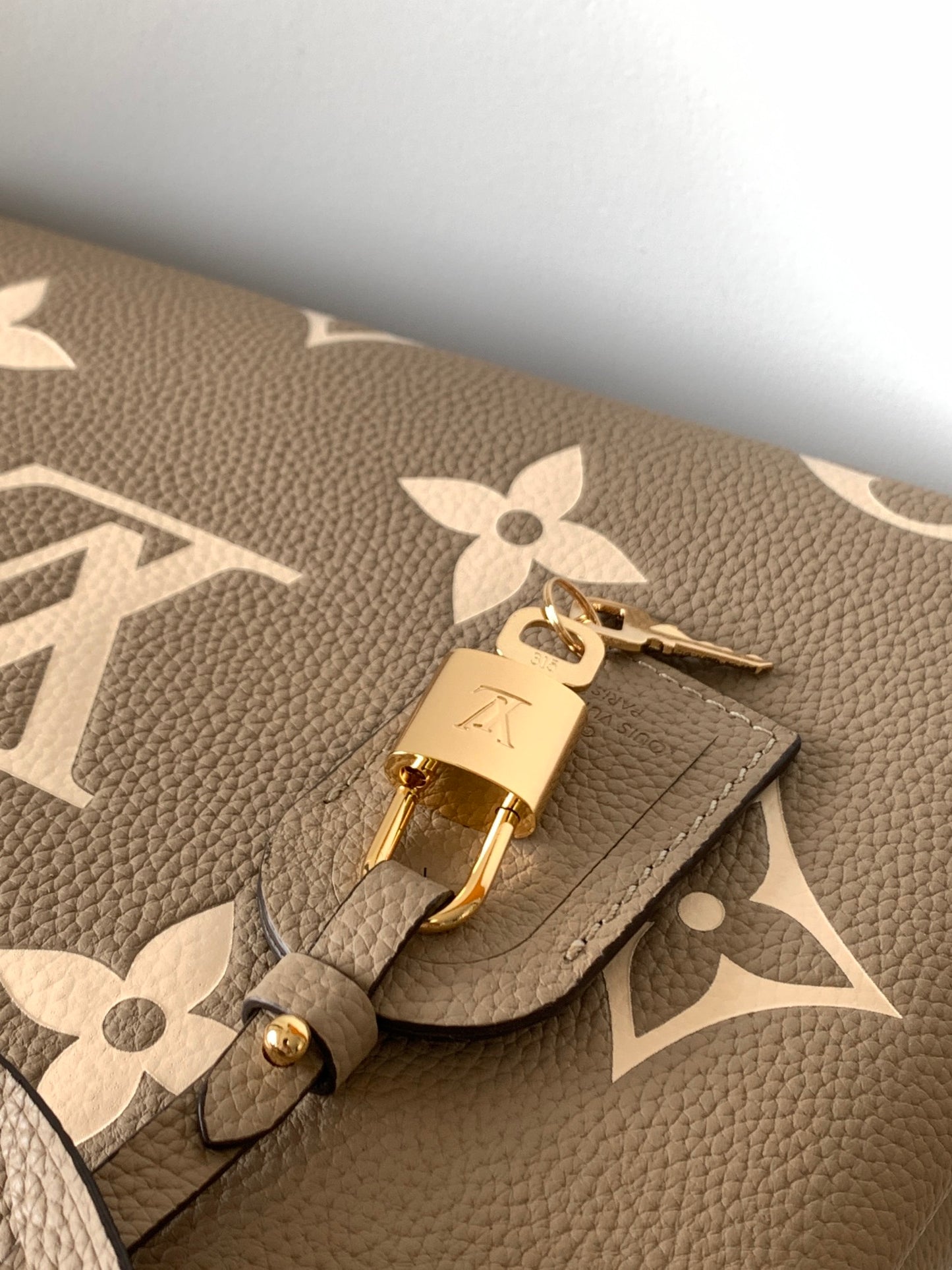 Louis Vuitton Rivoli PM Monogram Empreinte Leather Bag - Turtledove