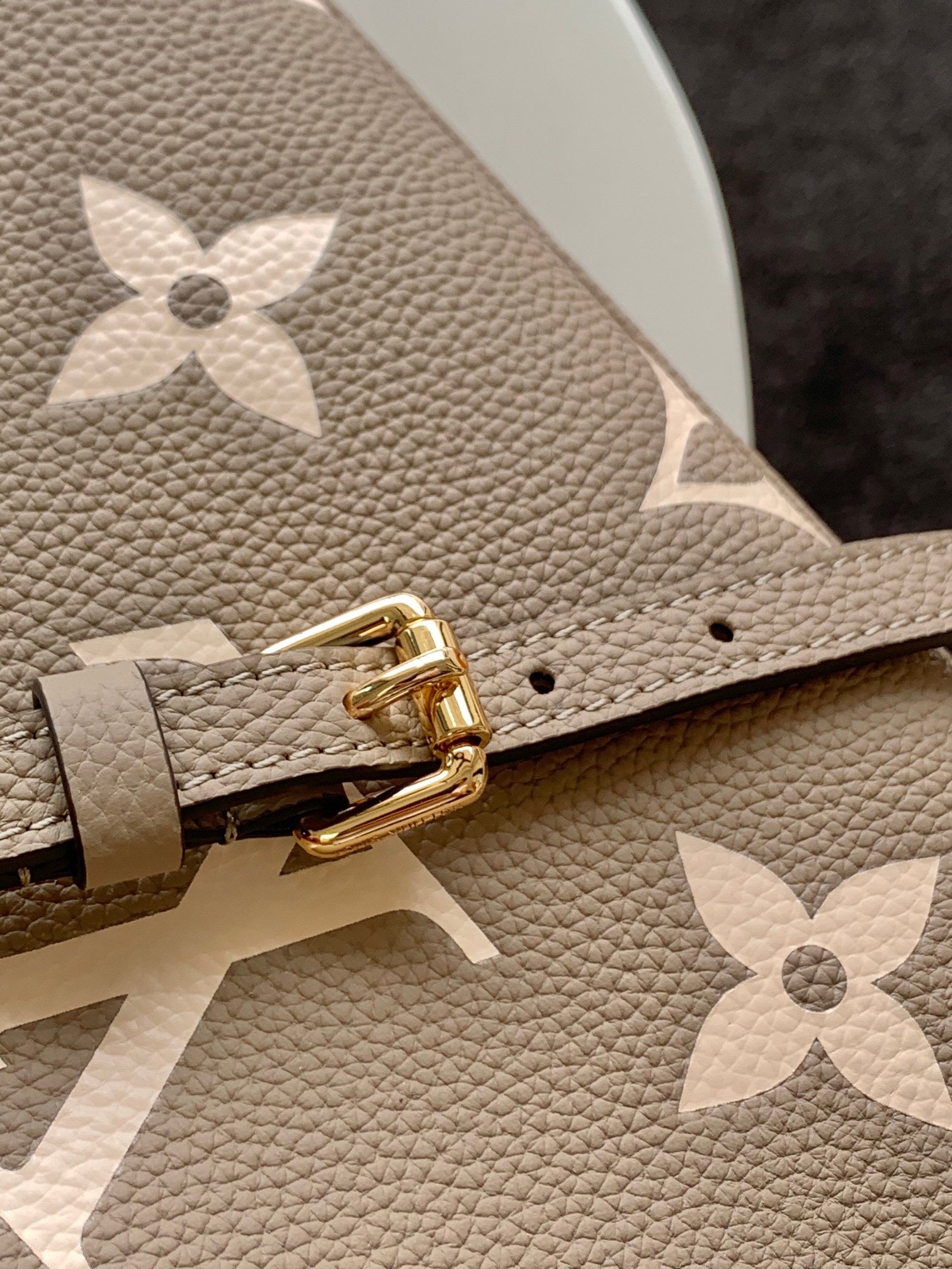 Louis Vuitton Rivoli PM Monogram Empreinte Leather Bag - Turtledove