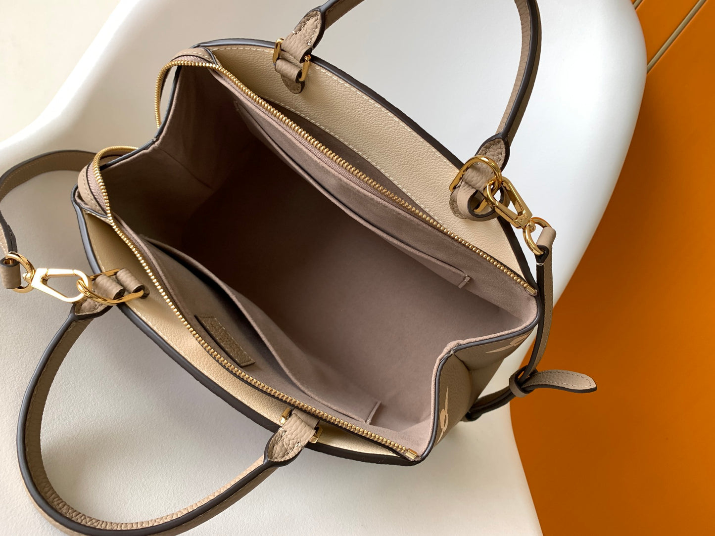 Louis Vuitton Rivoli PM Monogram Empreinte Leather Bag - Turtledove