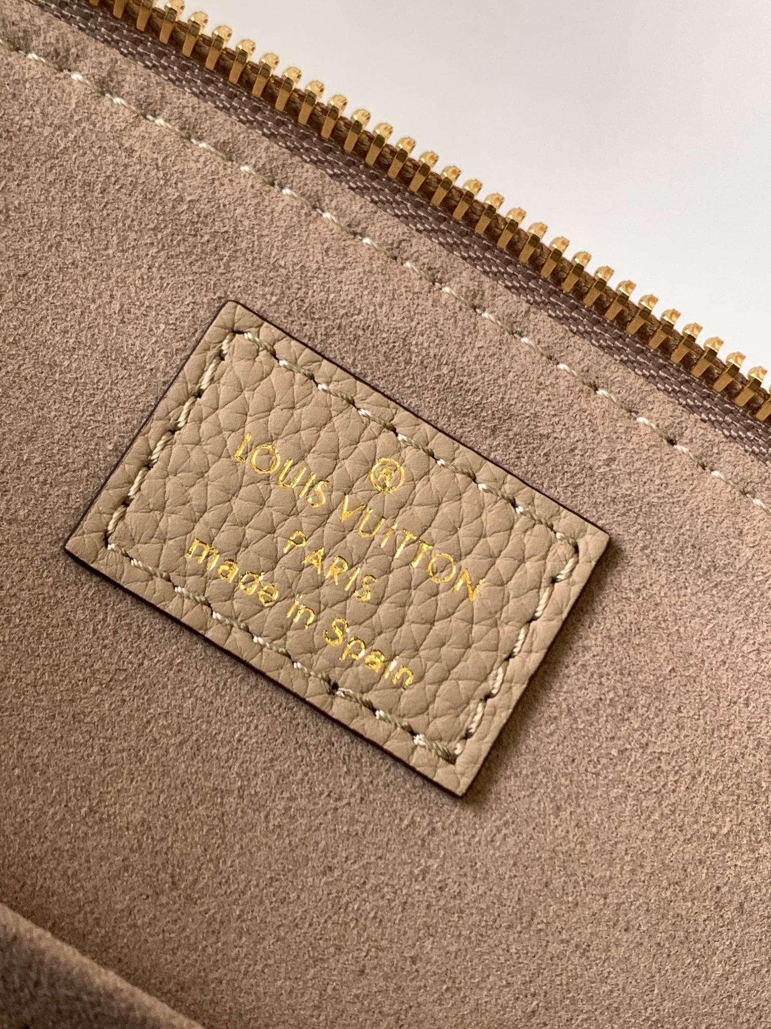 Louis Vuitton Rivoli PM Monogram Empreinte Leather Bag - Turtledove