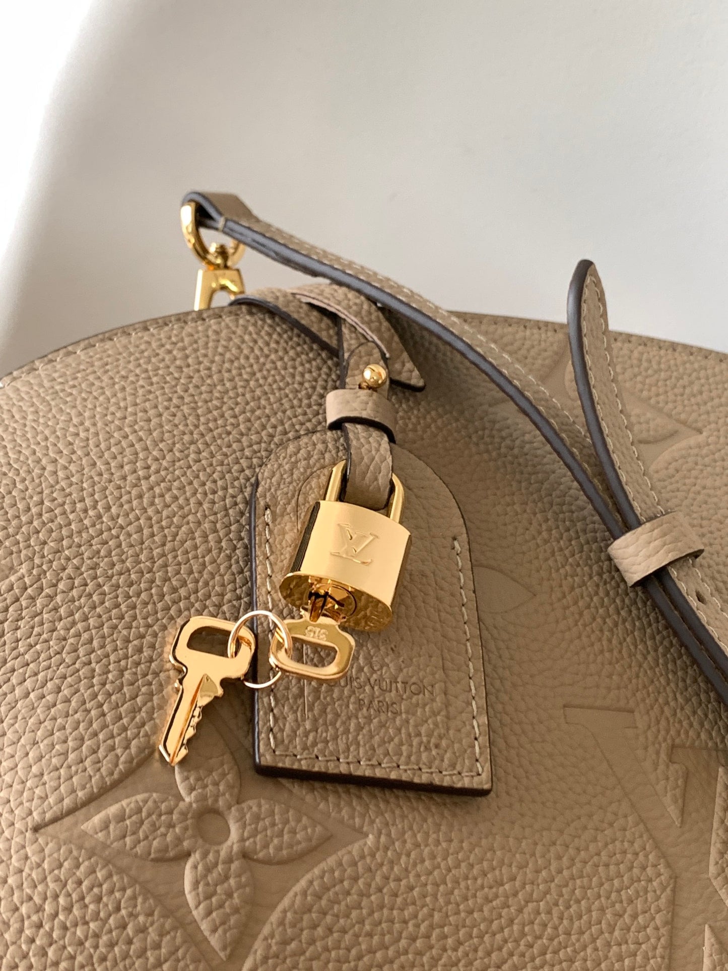 Louis Vuitton Montaigne BB Monogram Empreinte Leather Handbag - Tourterelle