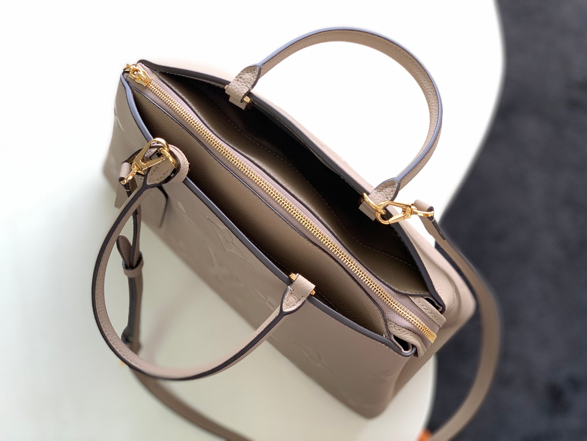 Louis Vuitton Montaigne BB Monogram Empreinte Leather Handbag - Tourterelle