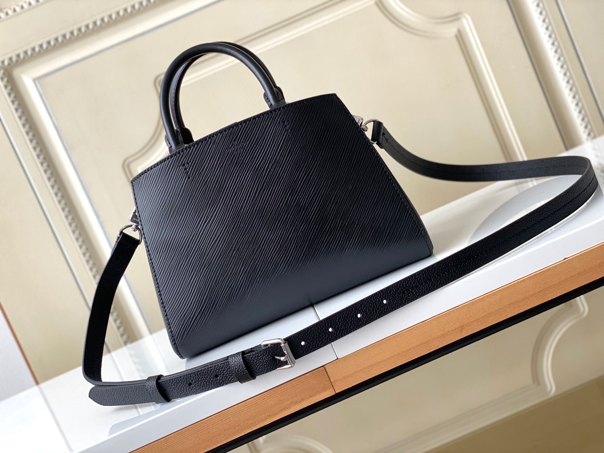 Louis Vuitton Black Top Handle Handbag with Silver Chain and Patterned Front Pocket