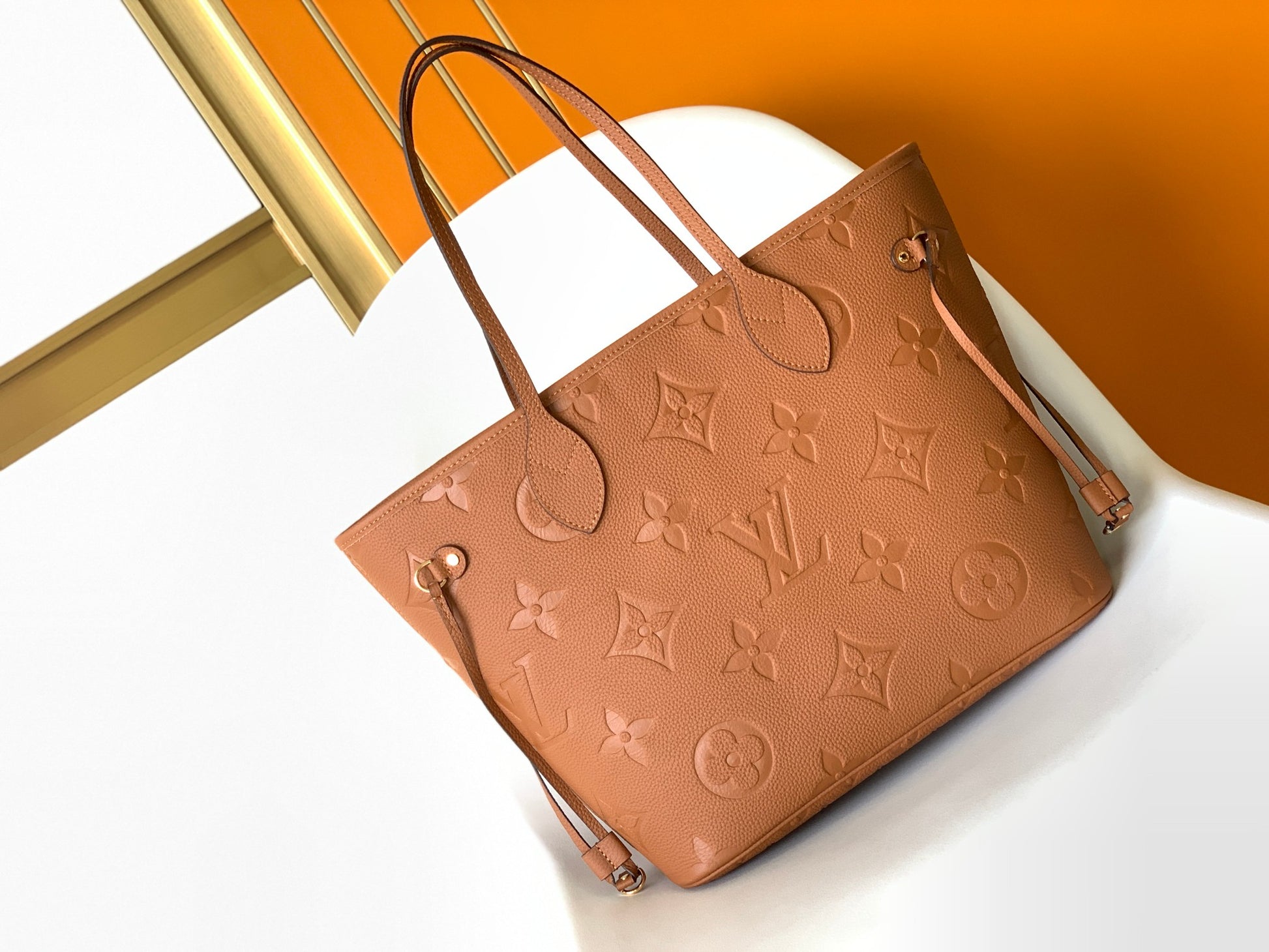 Brown Floral Embossed Leather Tote Bag with Side Drawstrings
