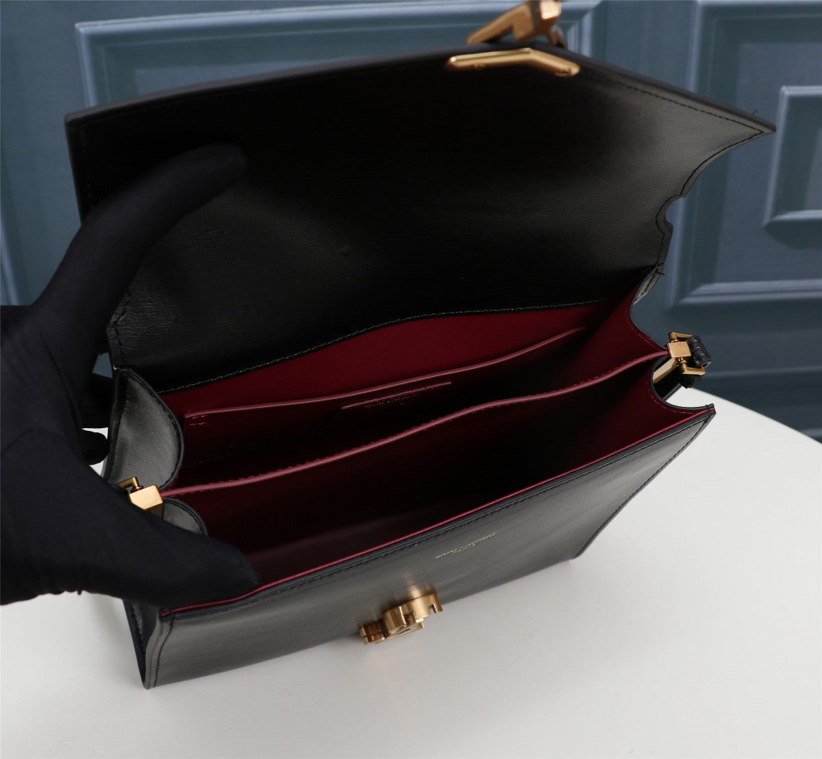 Saint Laurent Cassandra Medium Top Handle Bag in Black Leather