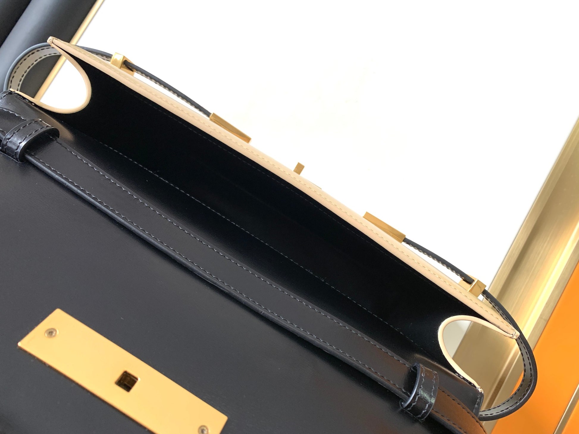 Two-Tone Cream and Black Leather Shoulder Bag with Gold Hardware