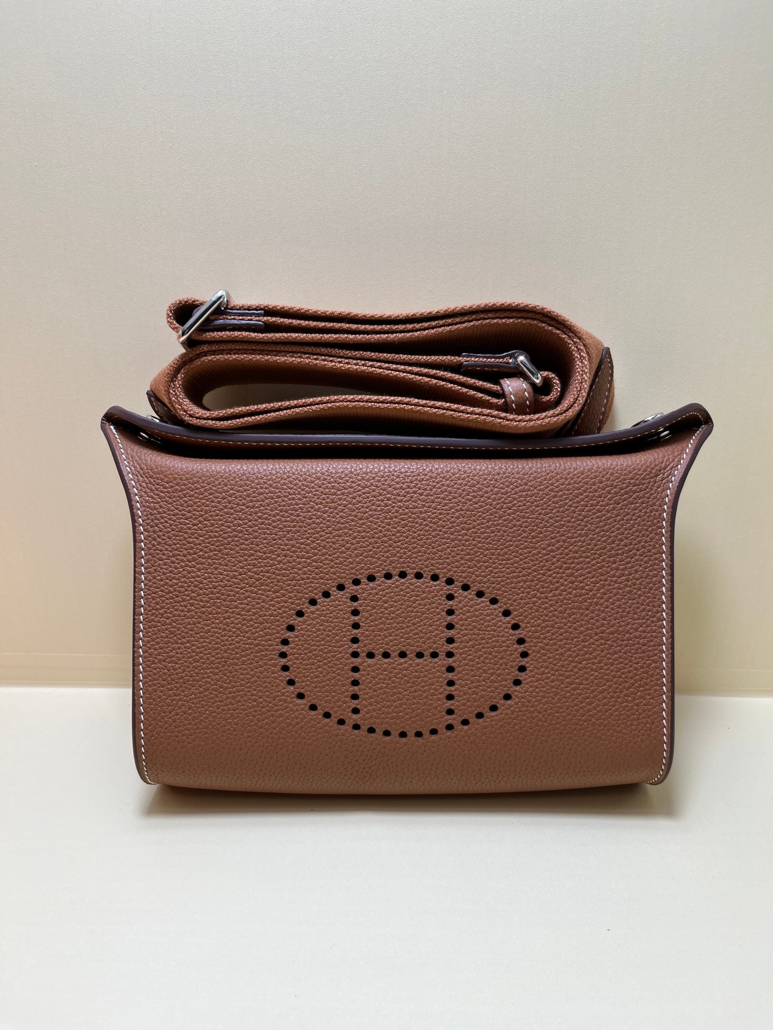 Small Brown Perforated Leather Crossbody Bag with Shoulder Strap
