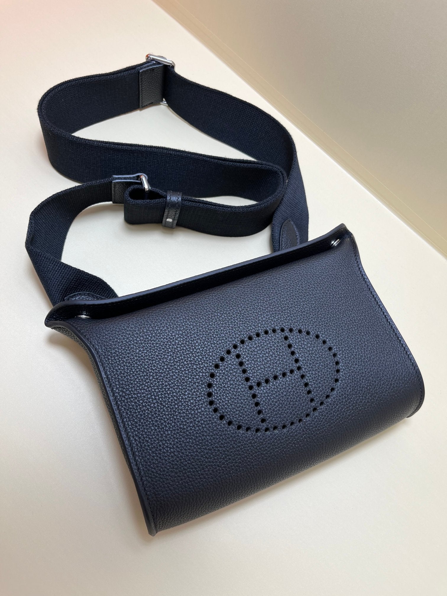 Hermes Evelyne TPM Noir Black Leather Crossbody Bag with Perforated H Logo