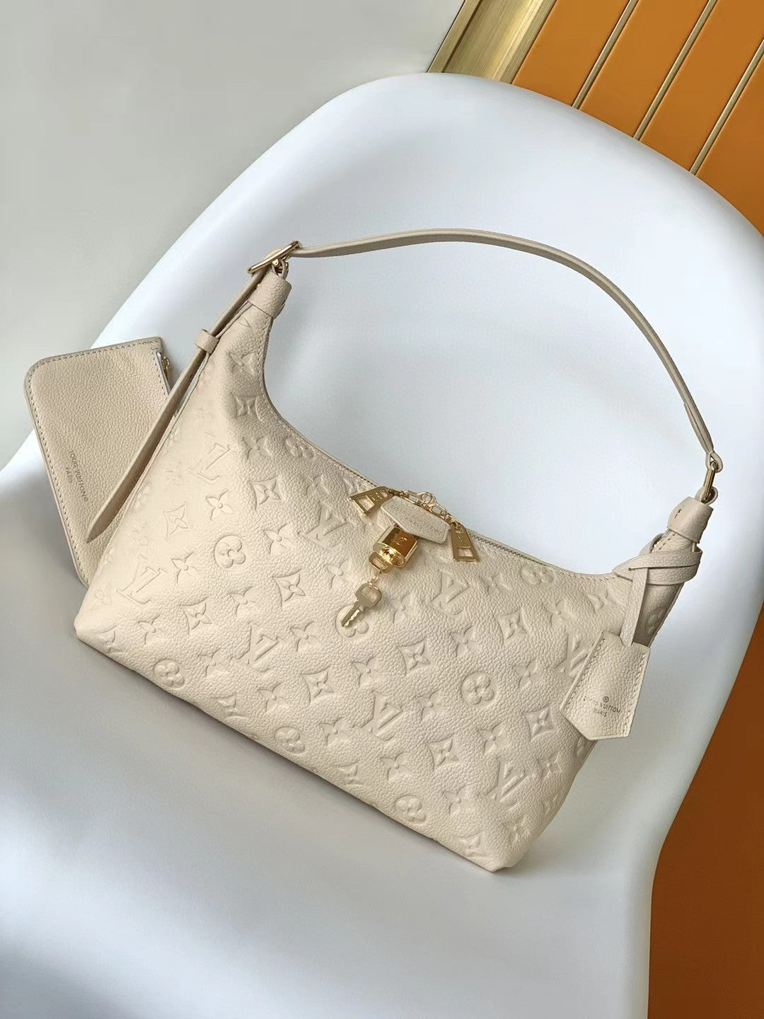 Louis Vuitton Bagatelle Monogram Empreinte Leather Shoulder Bag - Cream