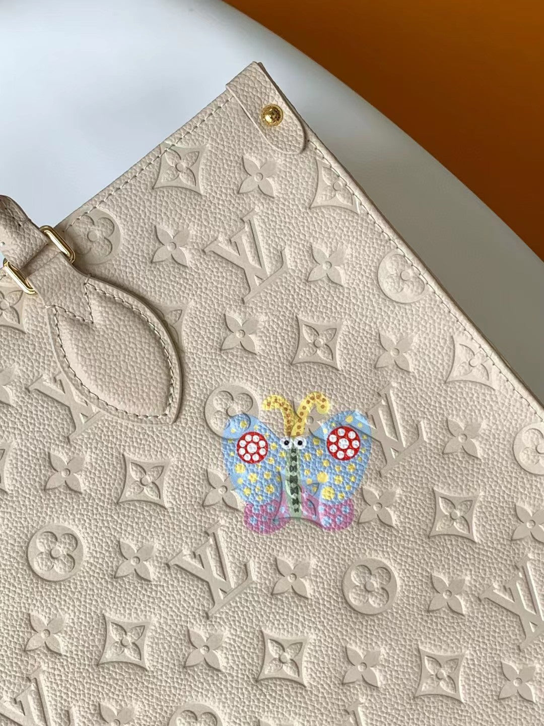 Louis Vuitton OnTheGo Monogram Empreinte Cream Leather Tote with Floral Embroidery