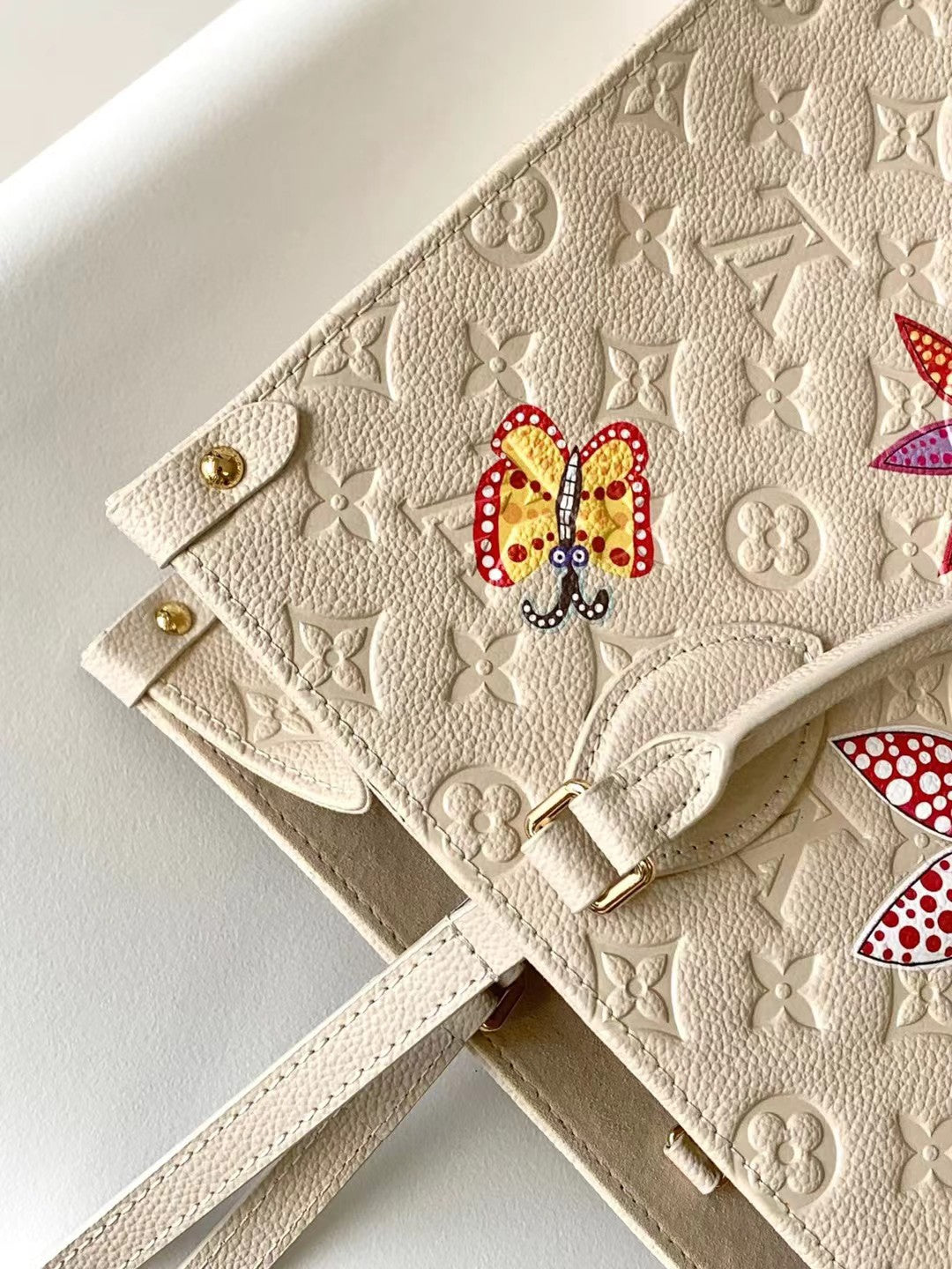 Louis Vuitton OnTheGo Monogram Empreinte Cream Leather Tote with Floral Embroidery