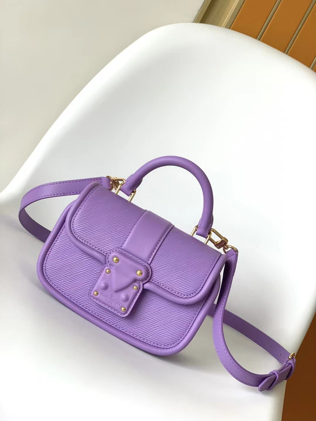 Mini Purple Textured Leather Handbag with Gold-Tone Hardware and Top Handle