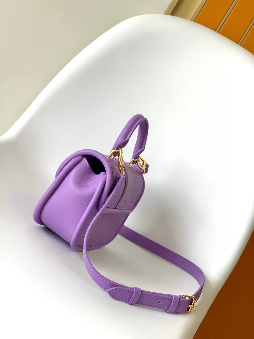 Mini Purple Textured Leather Handbag with Gold-Tone Hardware and Top Handle