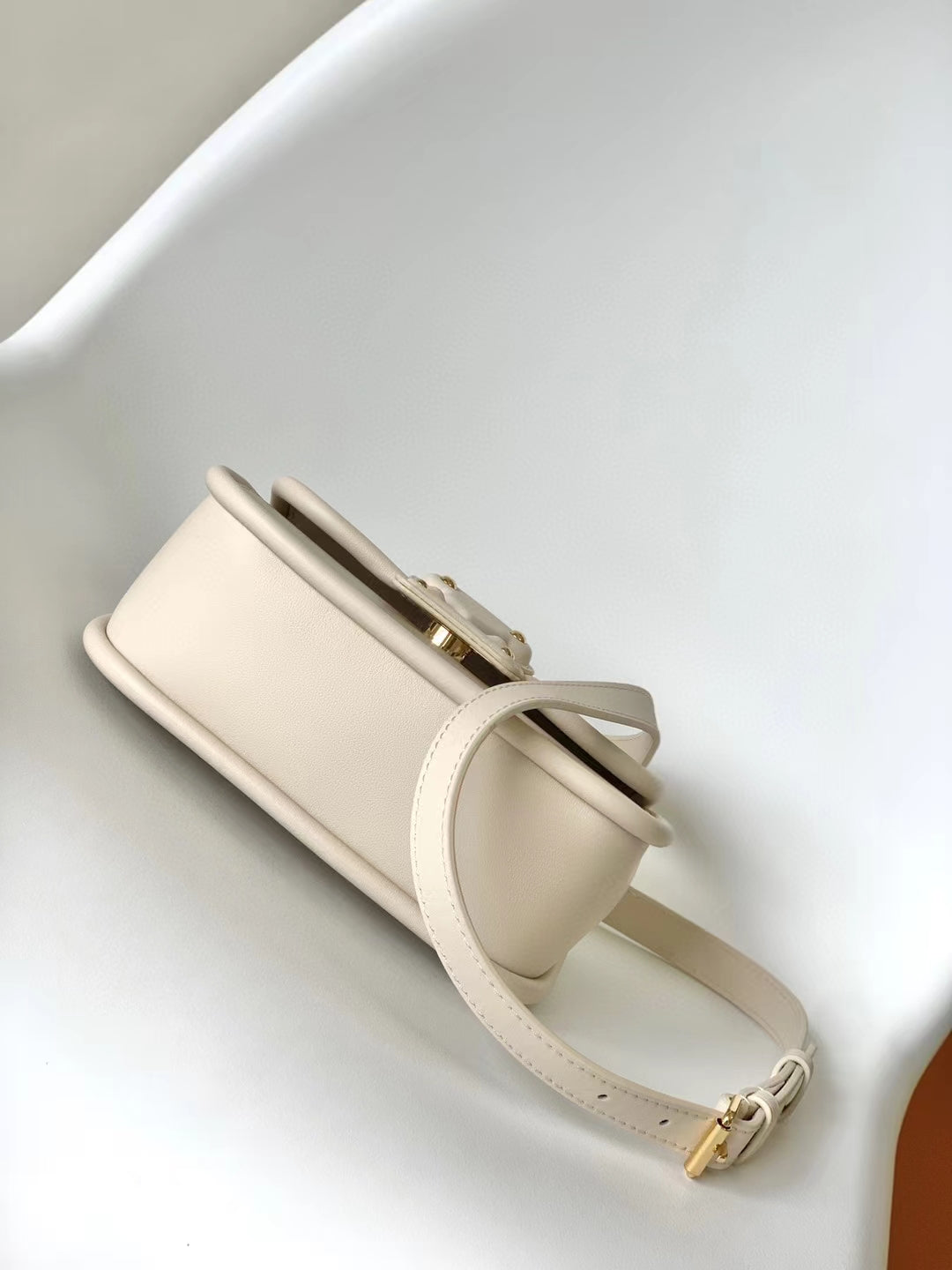 Elegant Beige Leather Micro Top Handle Bag with Gold Hardware