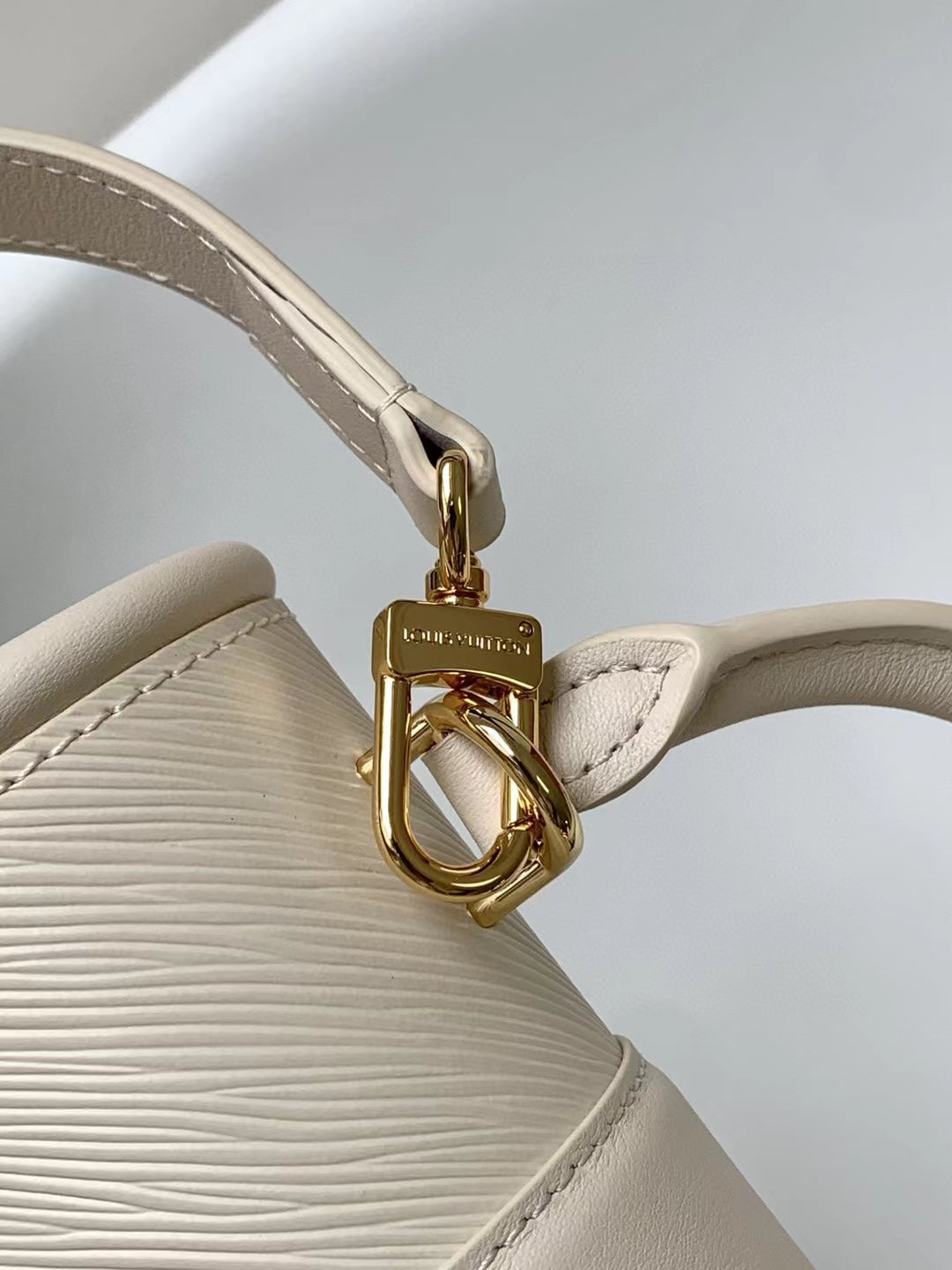 Elegant Beige Leather Micro Top Handle Bag with Gold Hardware