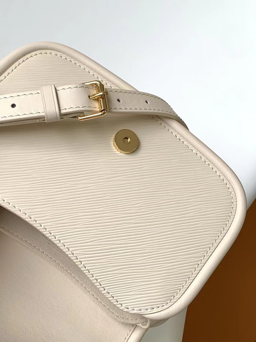 Elegant Beige Leather Micro Top Handle Bag with Gold Hardware