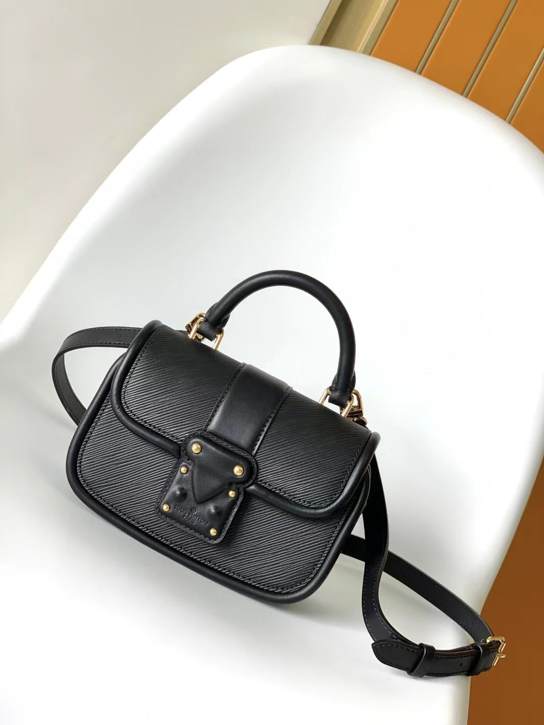 Elegant Black Leather Mini Top-Handle Handbag with Gold-Tone Hardware
