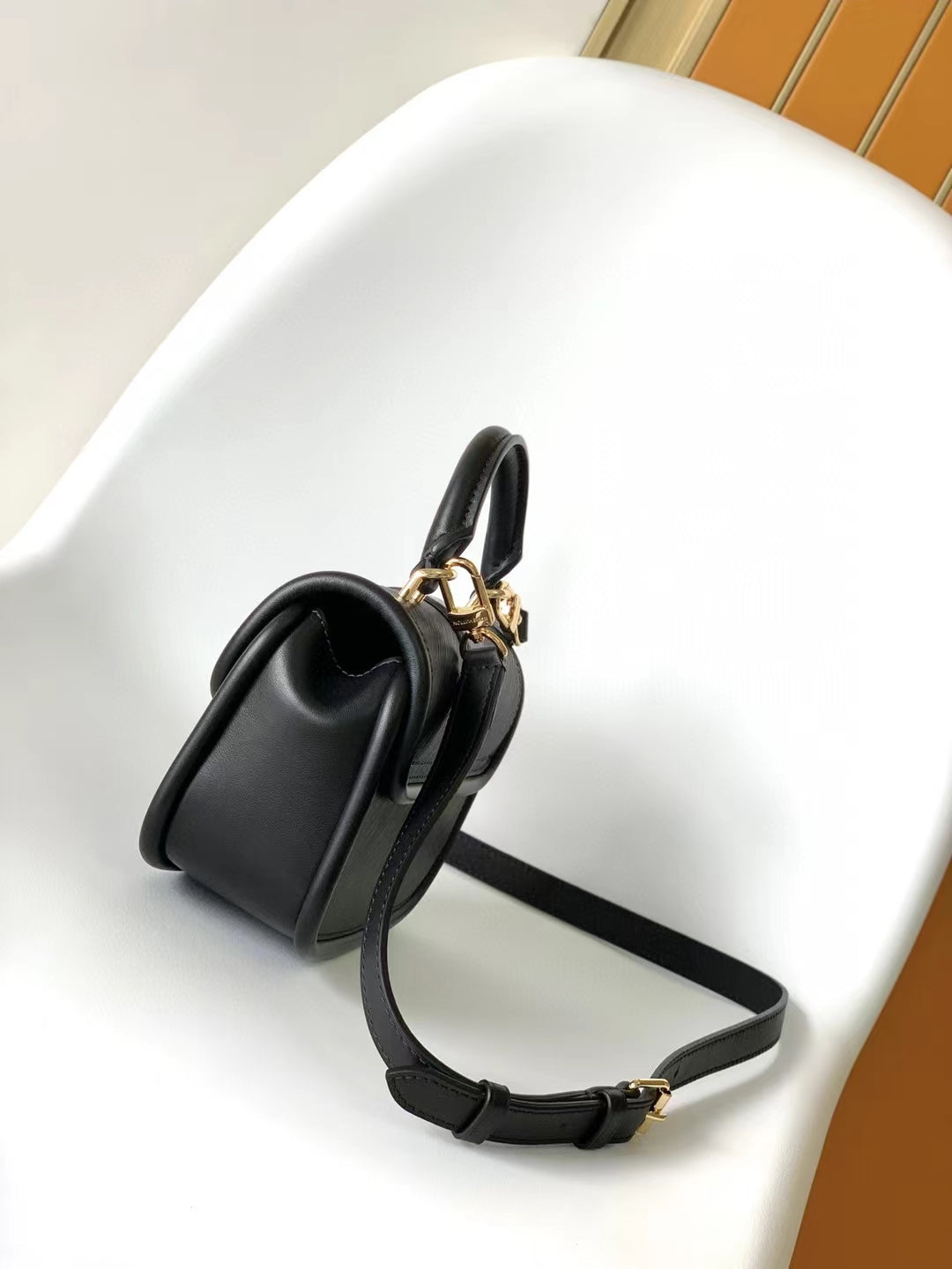 Elegant Black Leather Mini Top-Handle Handbag with Gold-Tone Hardware