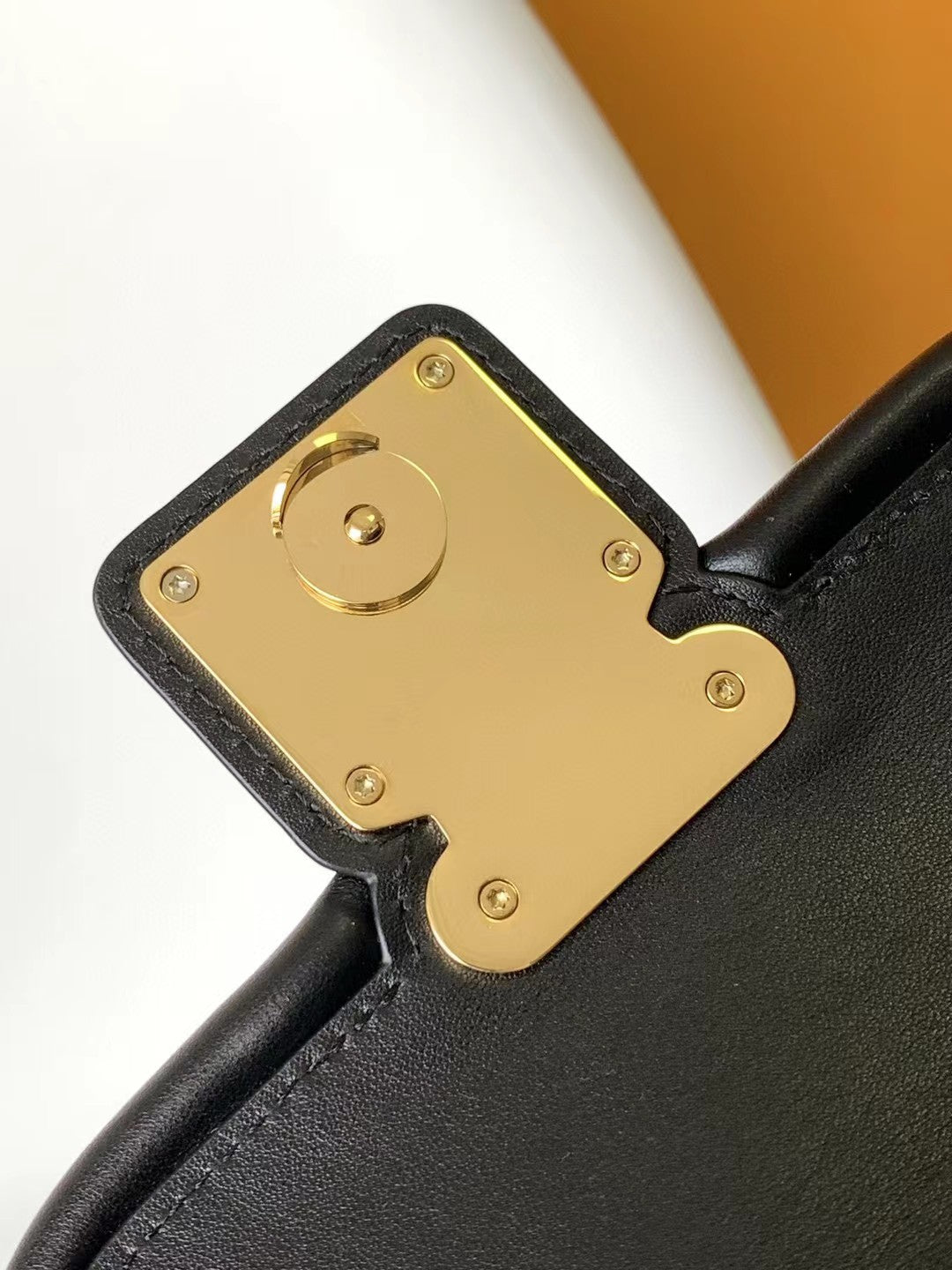 Elegant Black Leather Mini Top-Handle Handbag with Gold-Tone Hardware