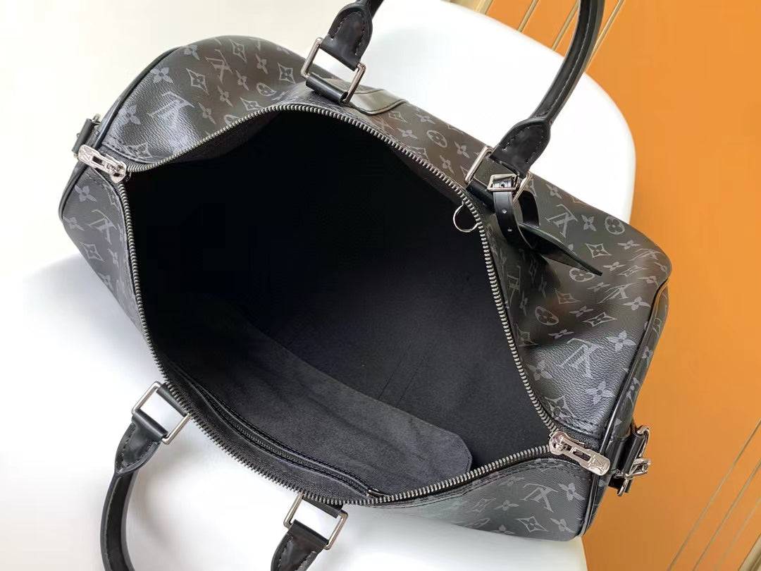 Louis Vuitton Keepall Bandoulière 50 Monogram Eclipse Canvas Duffle Bag