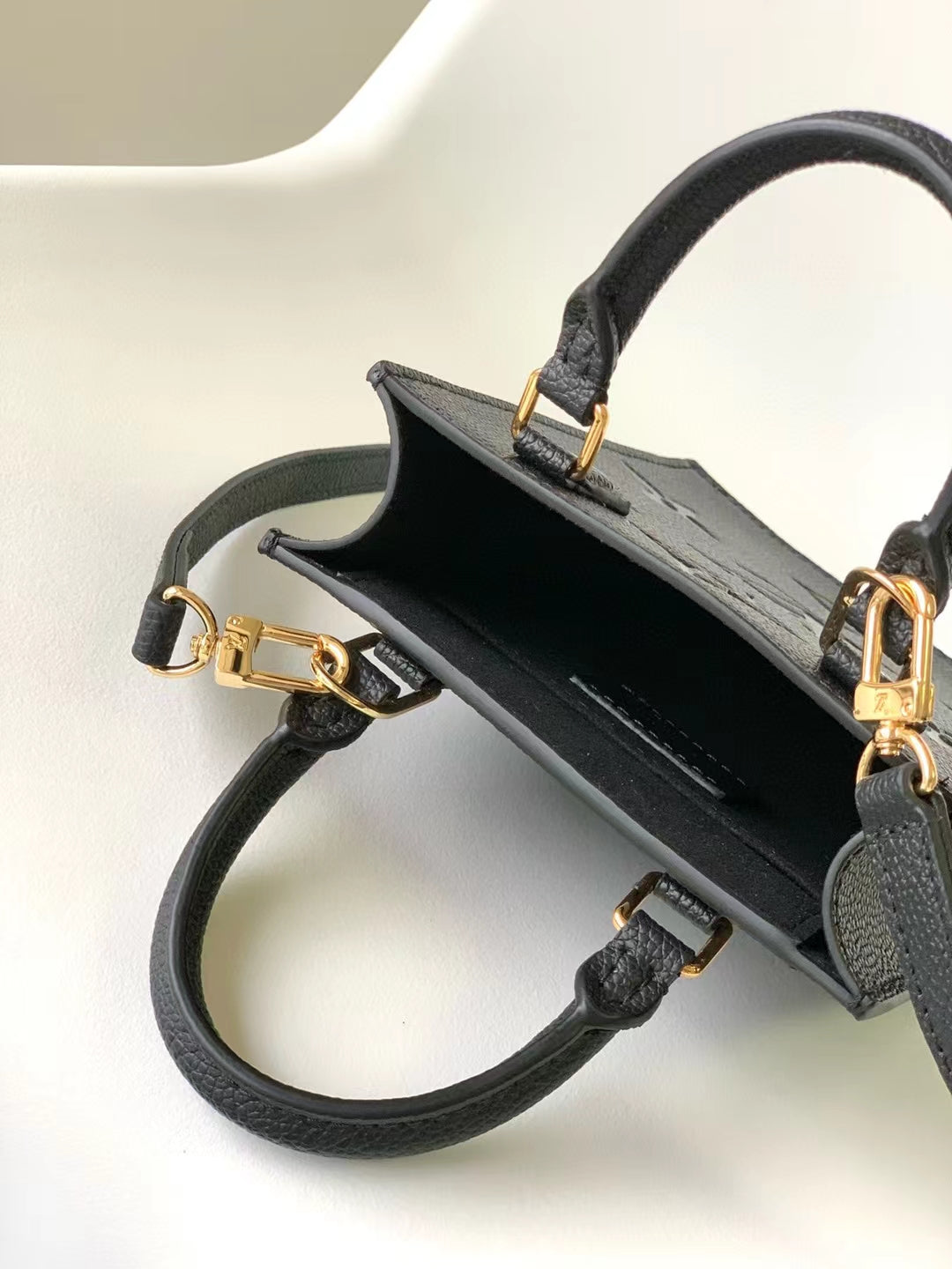 Louis Vuitton Petit Sac Plat Monogram Empreinte Leather Crossbody Bag - Black