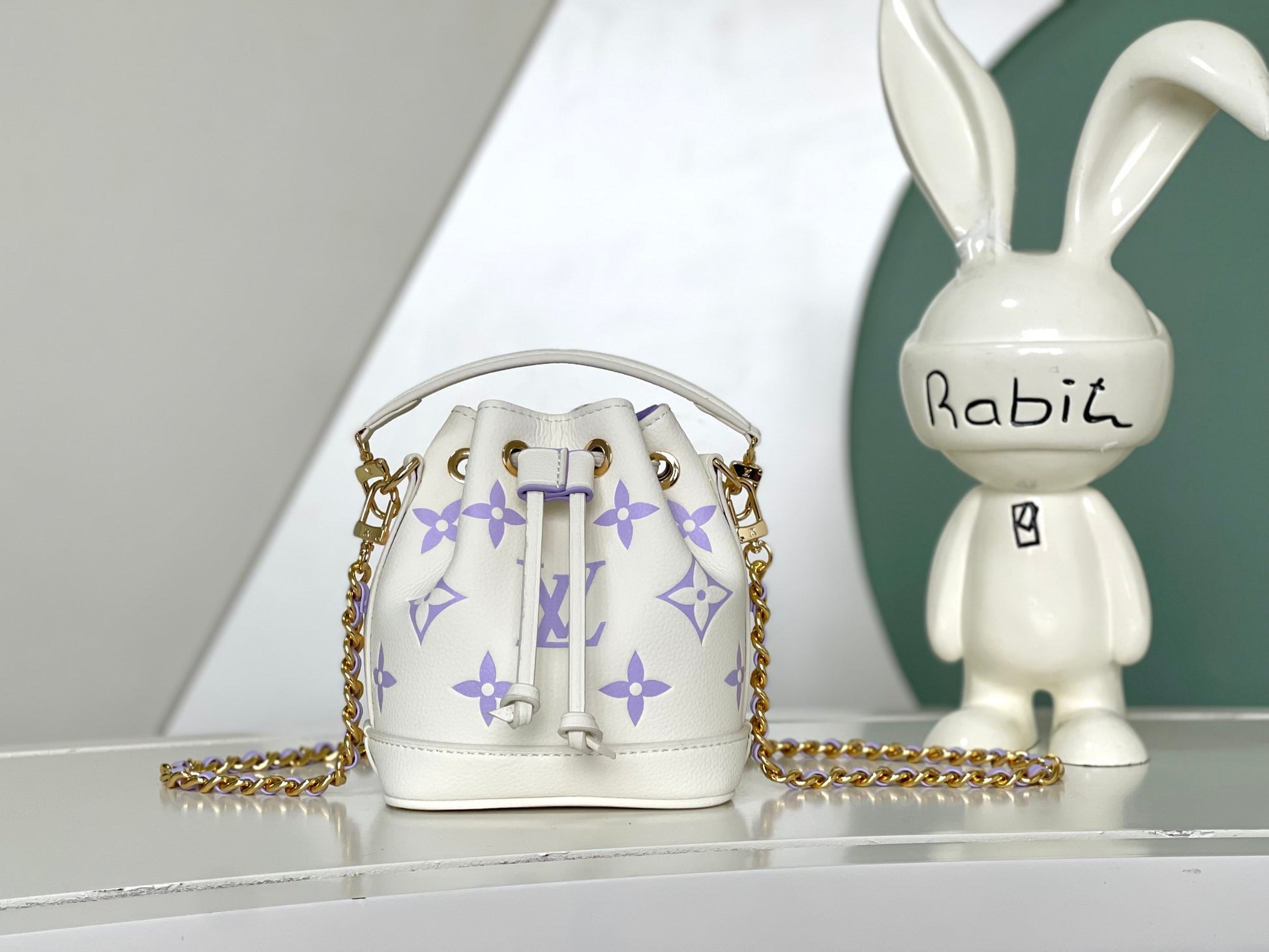 Mini Drawstring Bucket Crossbody Bag - White with Purple Monogram & Gold Chain