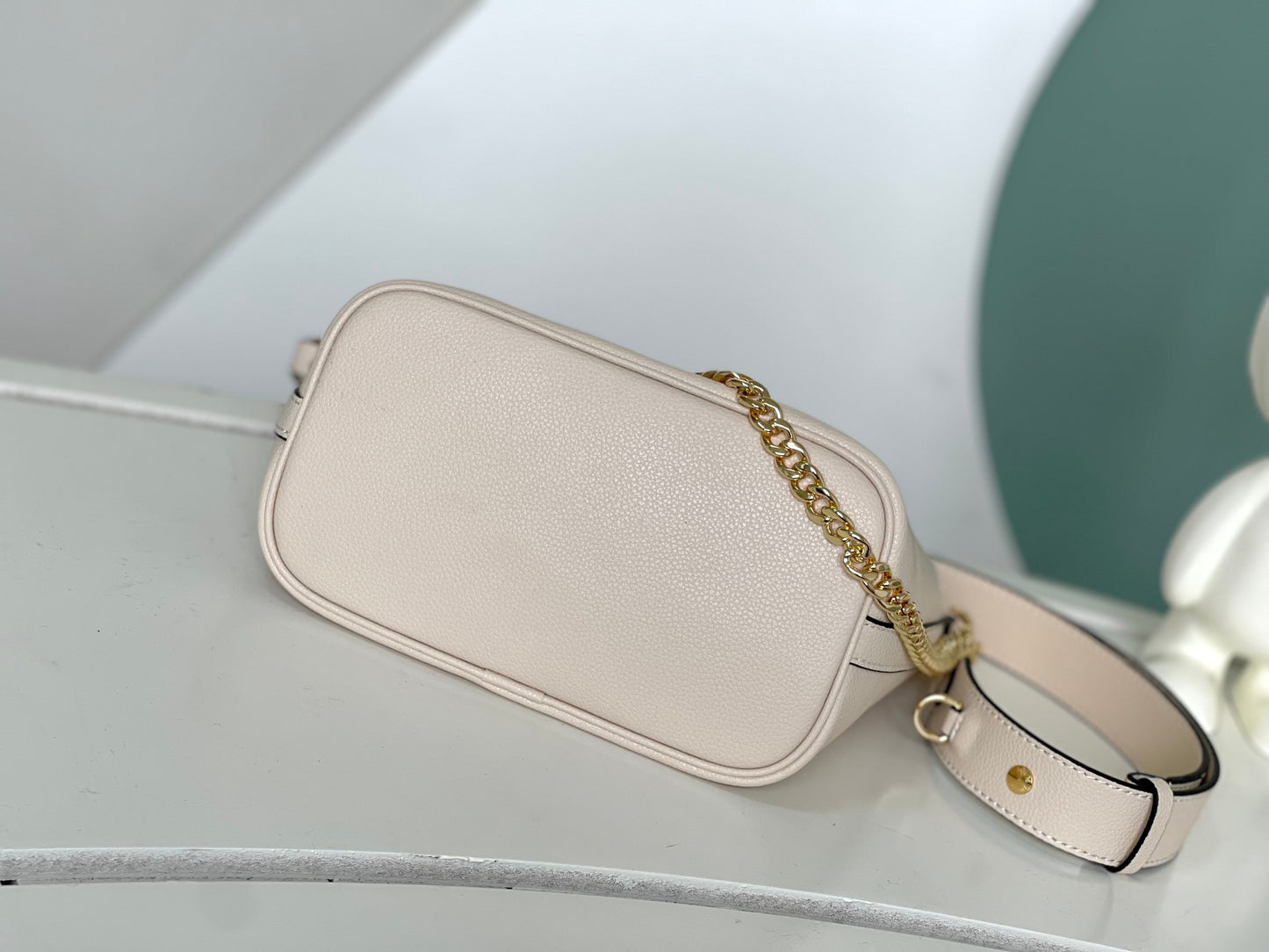 Louis Vuitton Lockme Bucket Bag in Cream Grained Leather with Gold-Tone Hardware